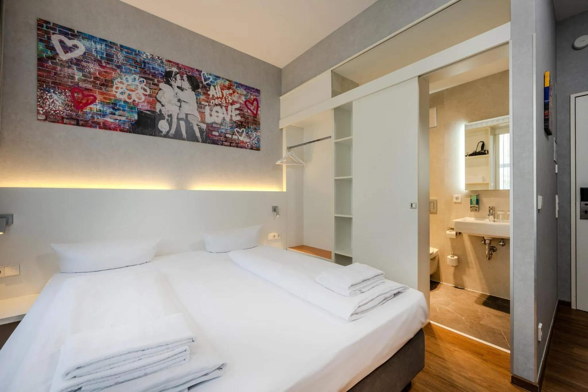 Photo of the whole room, Bed in mk hotel berlin