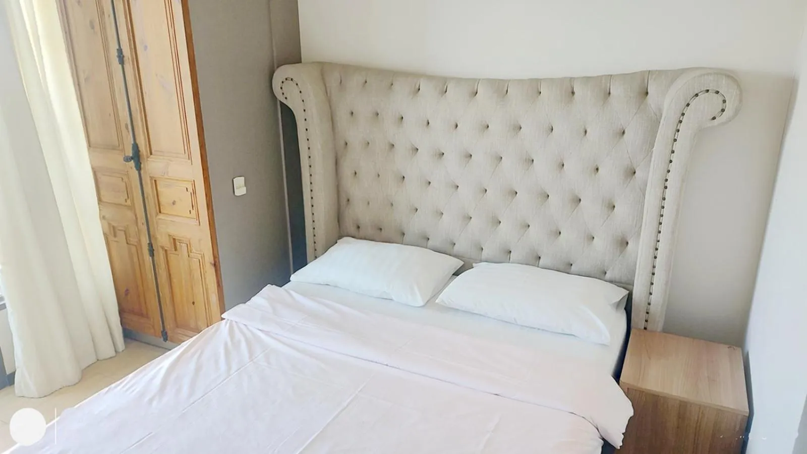 Bed in Venetian Poseidon Pool Hotel