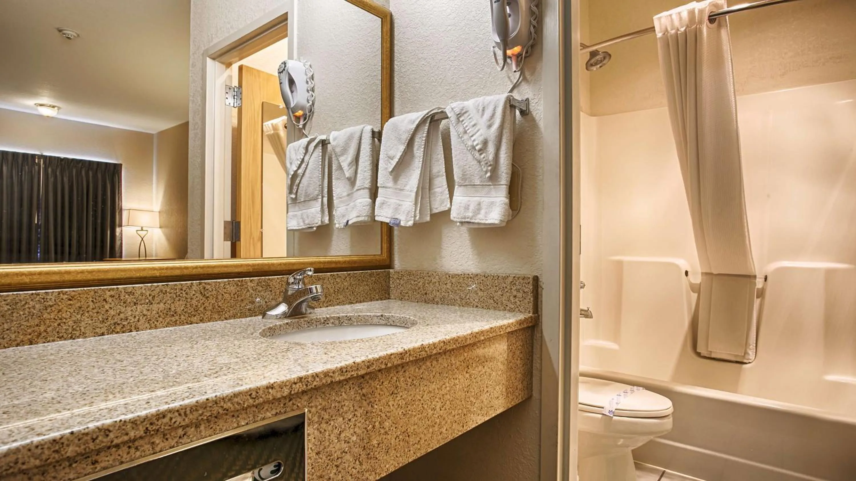 Bathroom in SureStay Hotel by Best Western Ottawa
