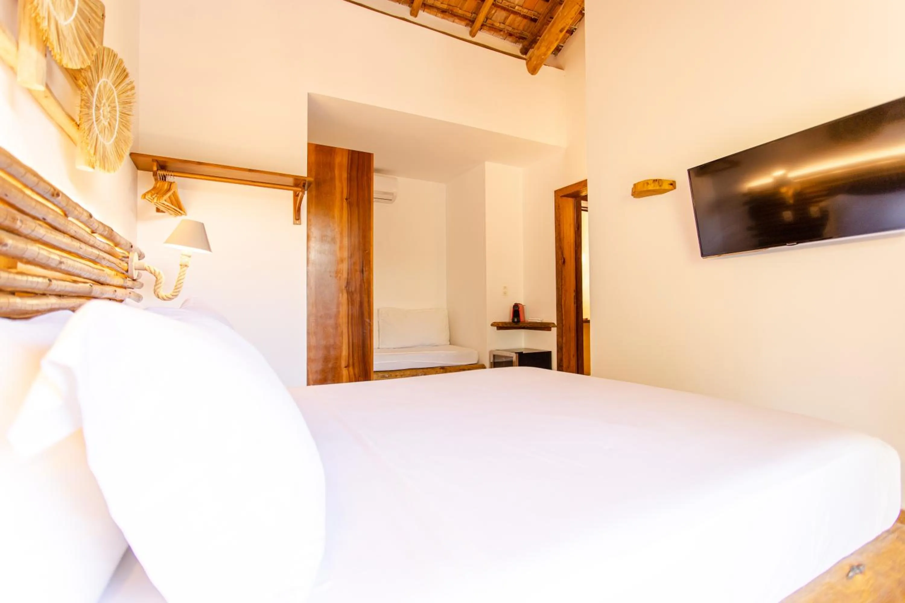 Communal lounge/ TV room, Bed in VillaMag