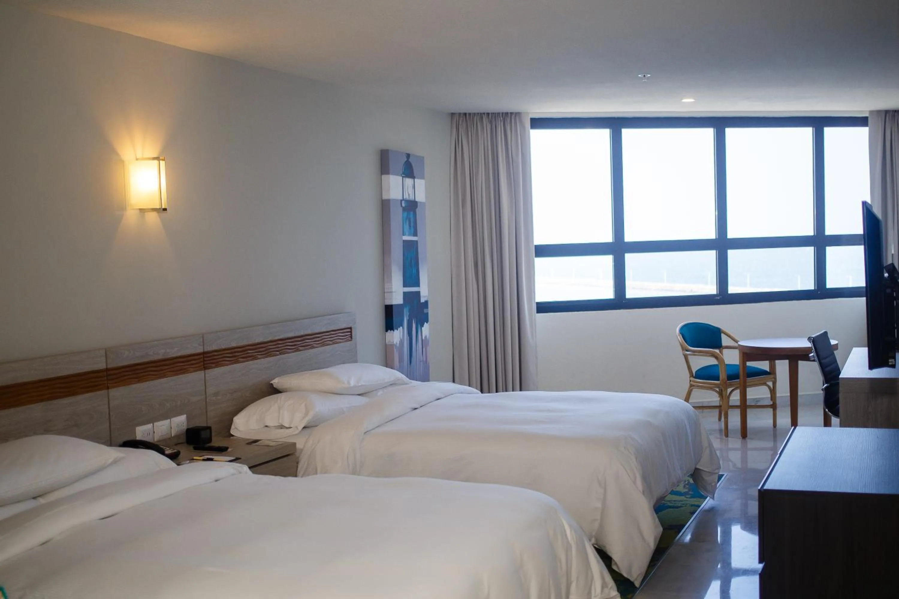 Photo of the whole room, Bed in DoubleTree by Hilton Veracruz