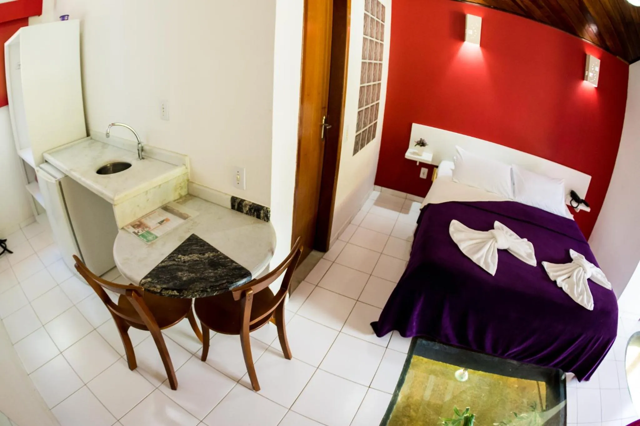 Bed in Pousada Suarez