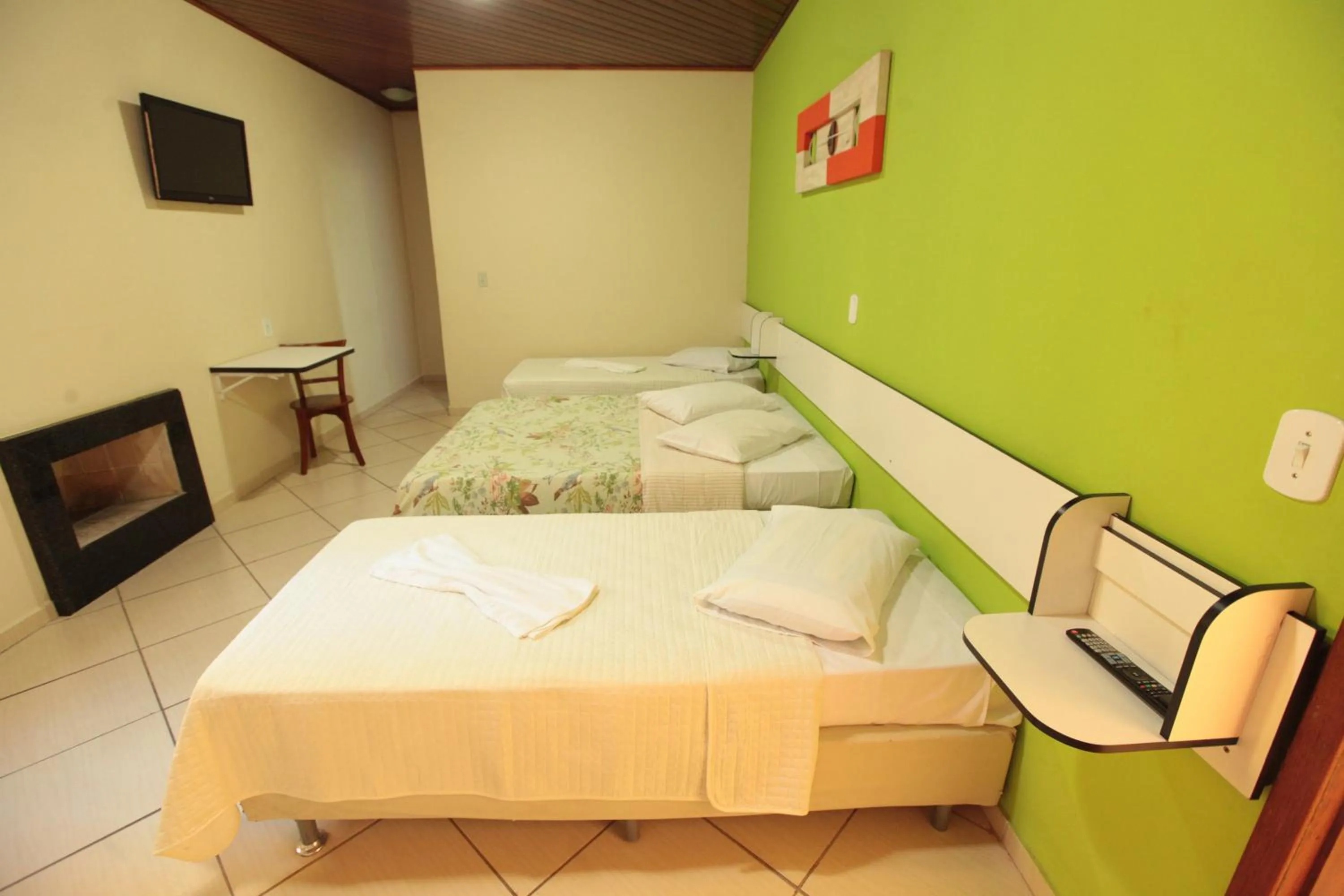 Bed in Pousada Suarez