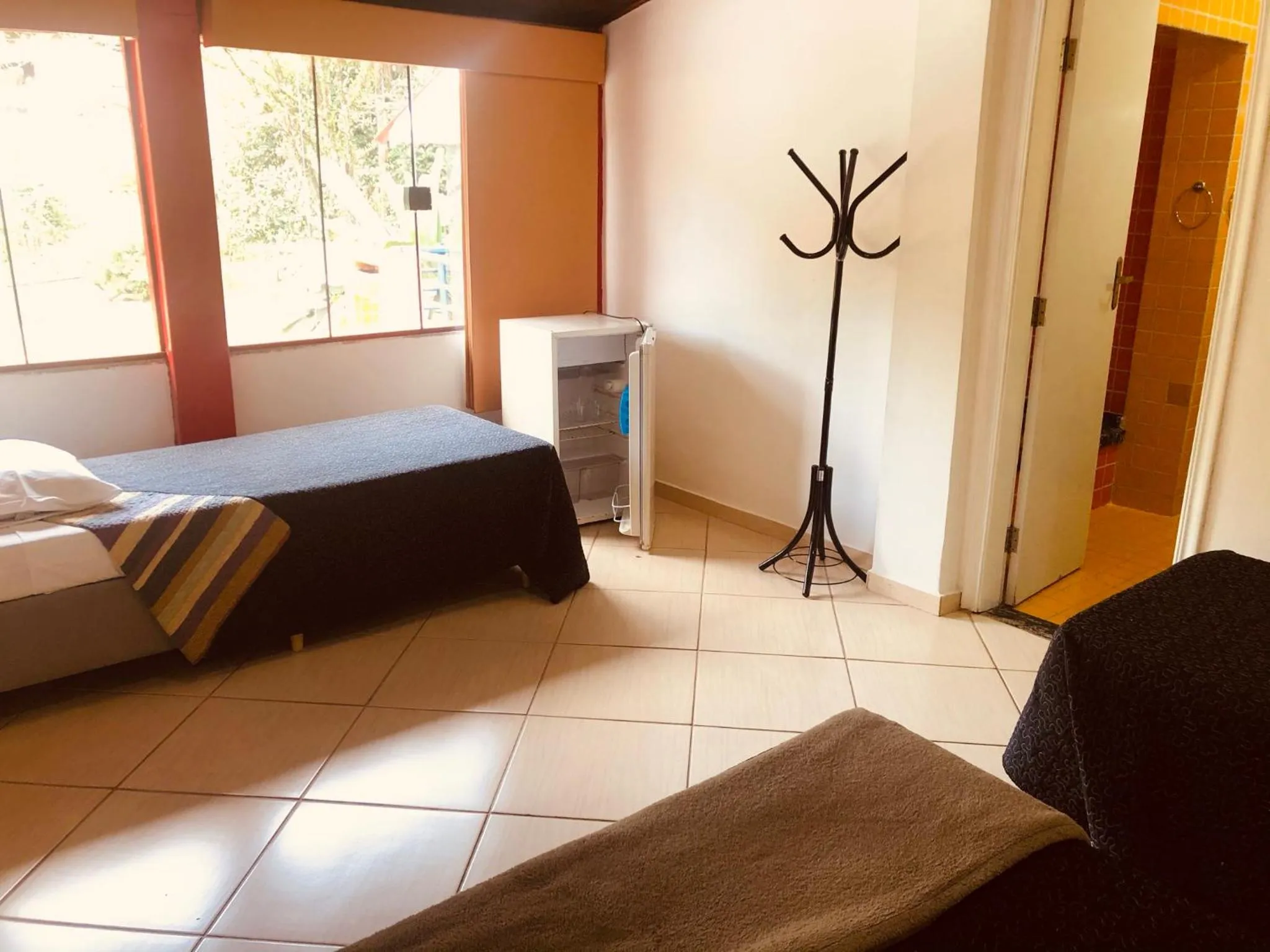 Bed in Pousada Suarez