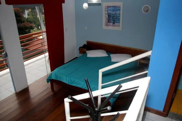 Bed in Pousada Suarez