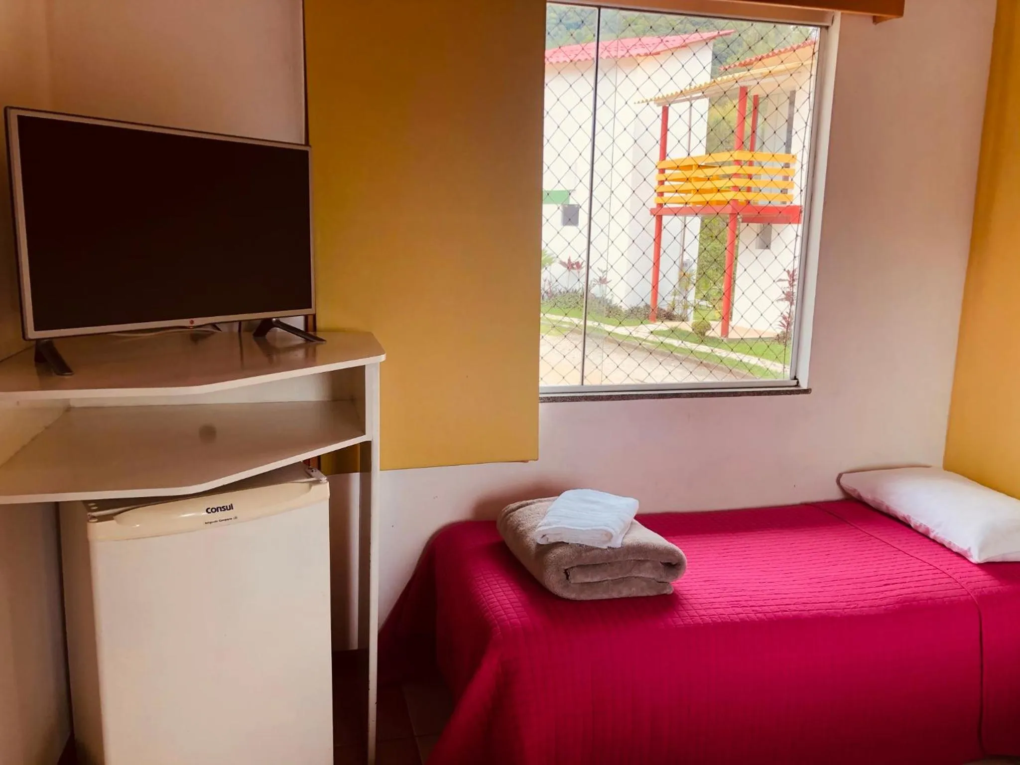 Bed in Pousada Suarez