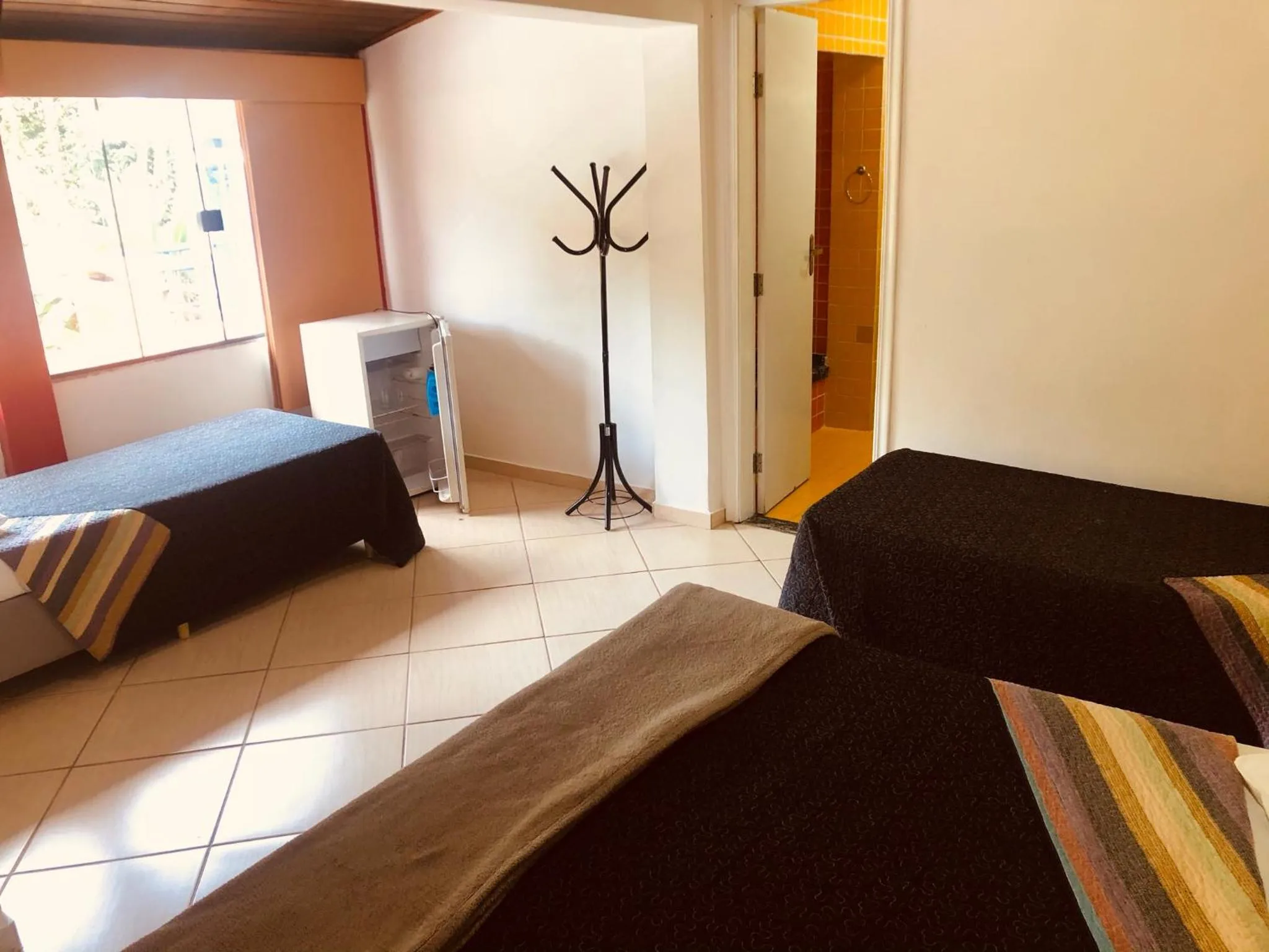 Bed in Pousada Suarez