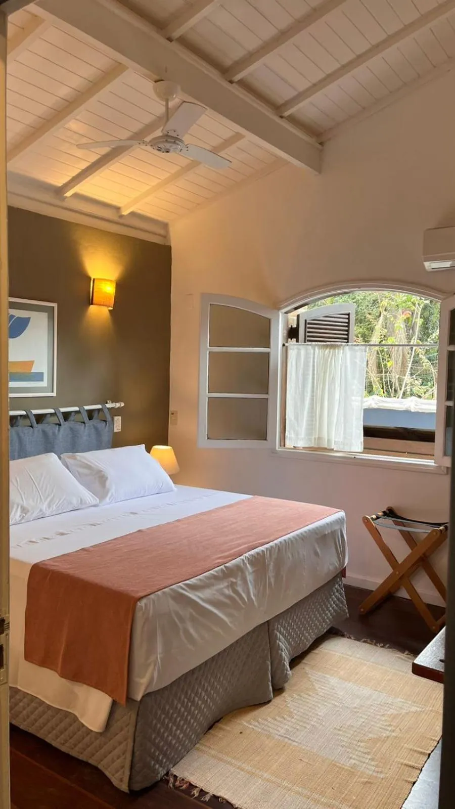 Bed in Pousada Canto do Camburi