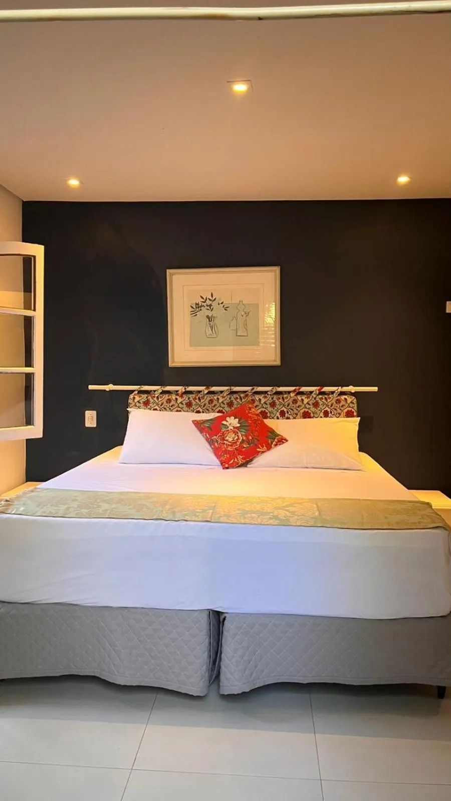 Bed in Pousada Canto do Camburi