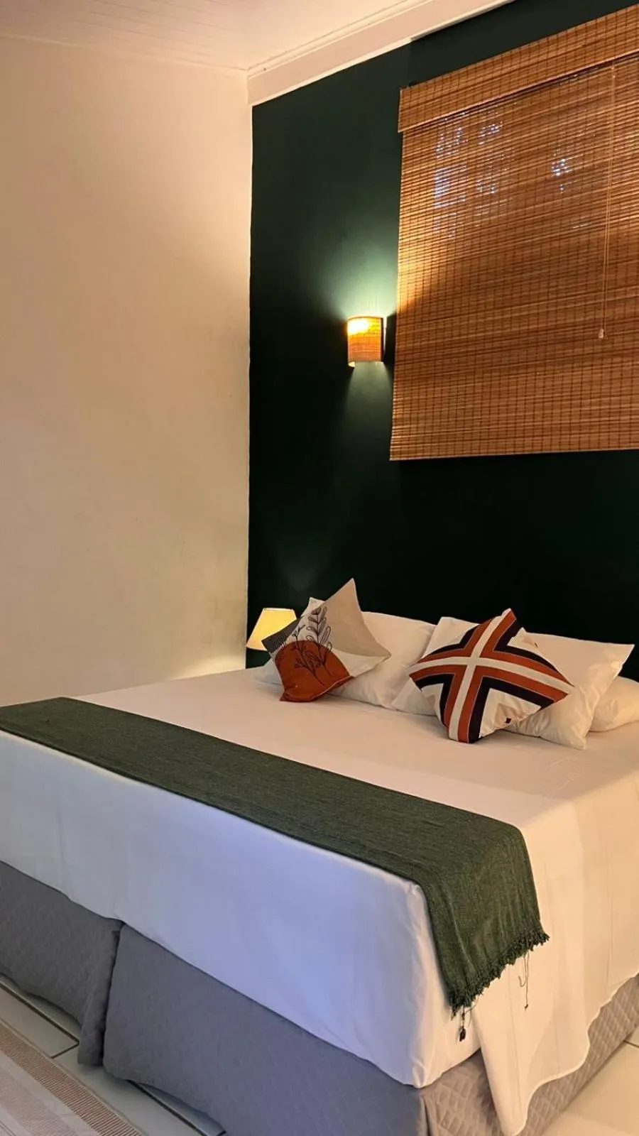 Bed in Pousada Canto do Camburi