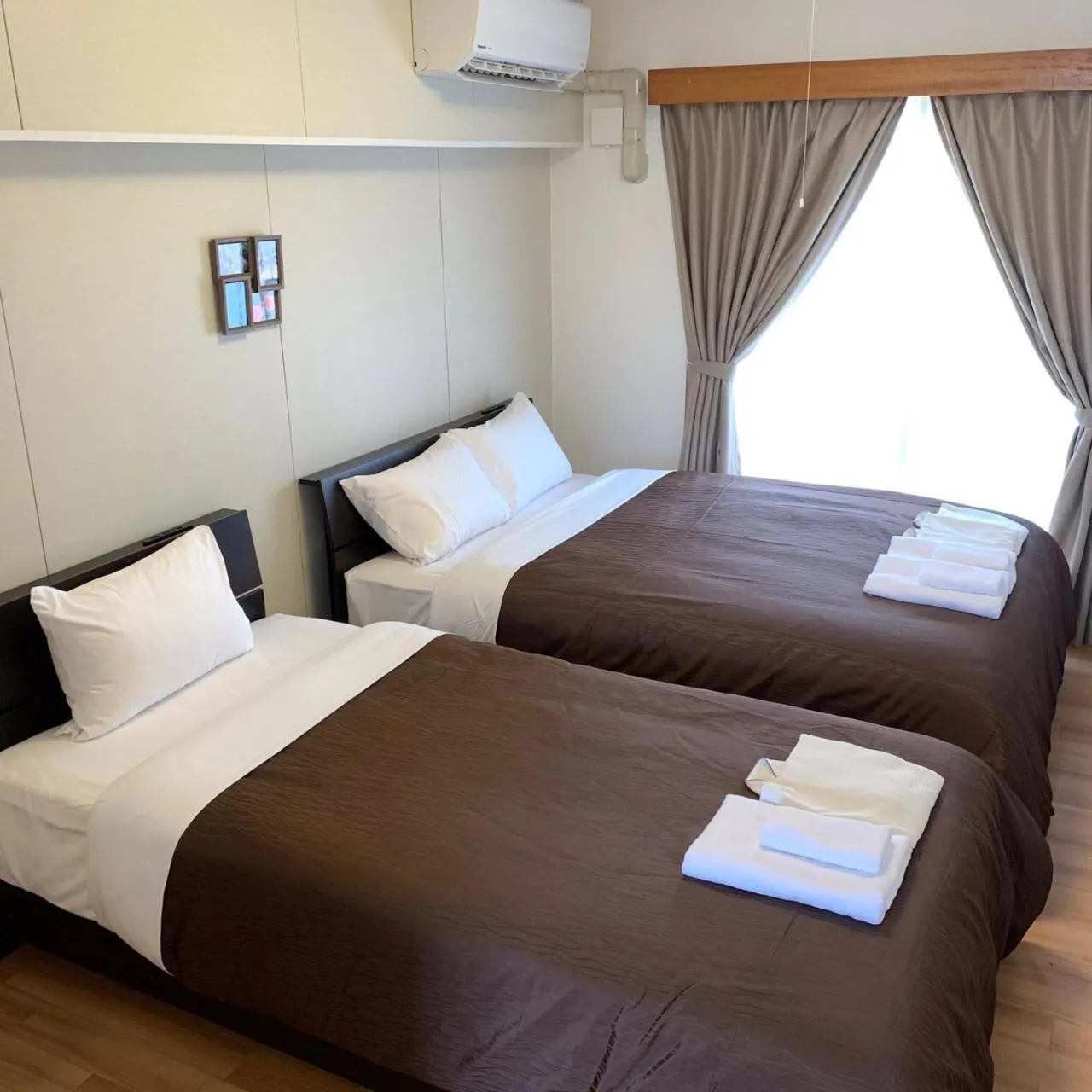 Bed in Y' RISE TO HOTEL Miyakojima