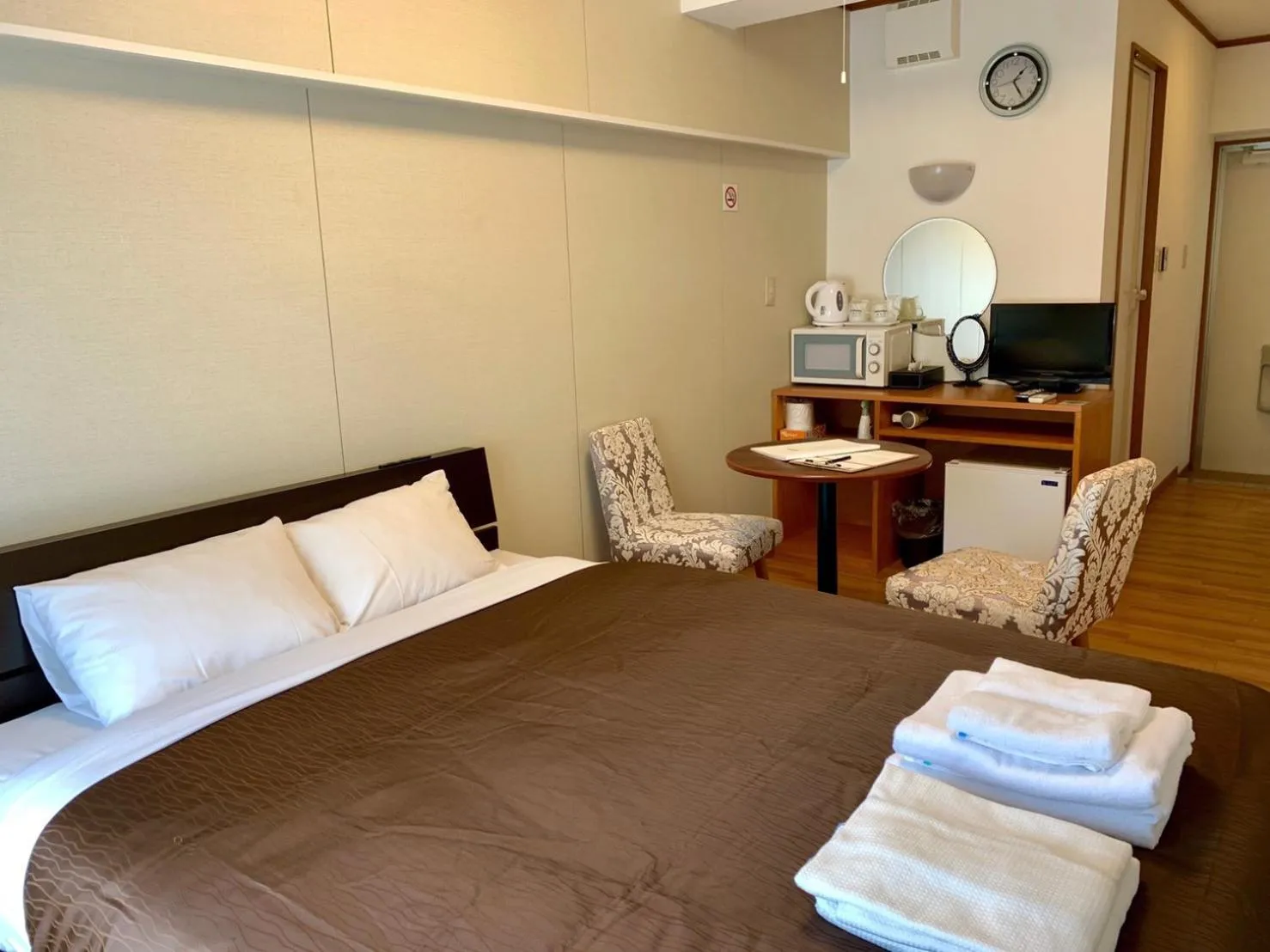 Bed in Y' RISE TO HOTEL Miyakojima