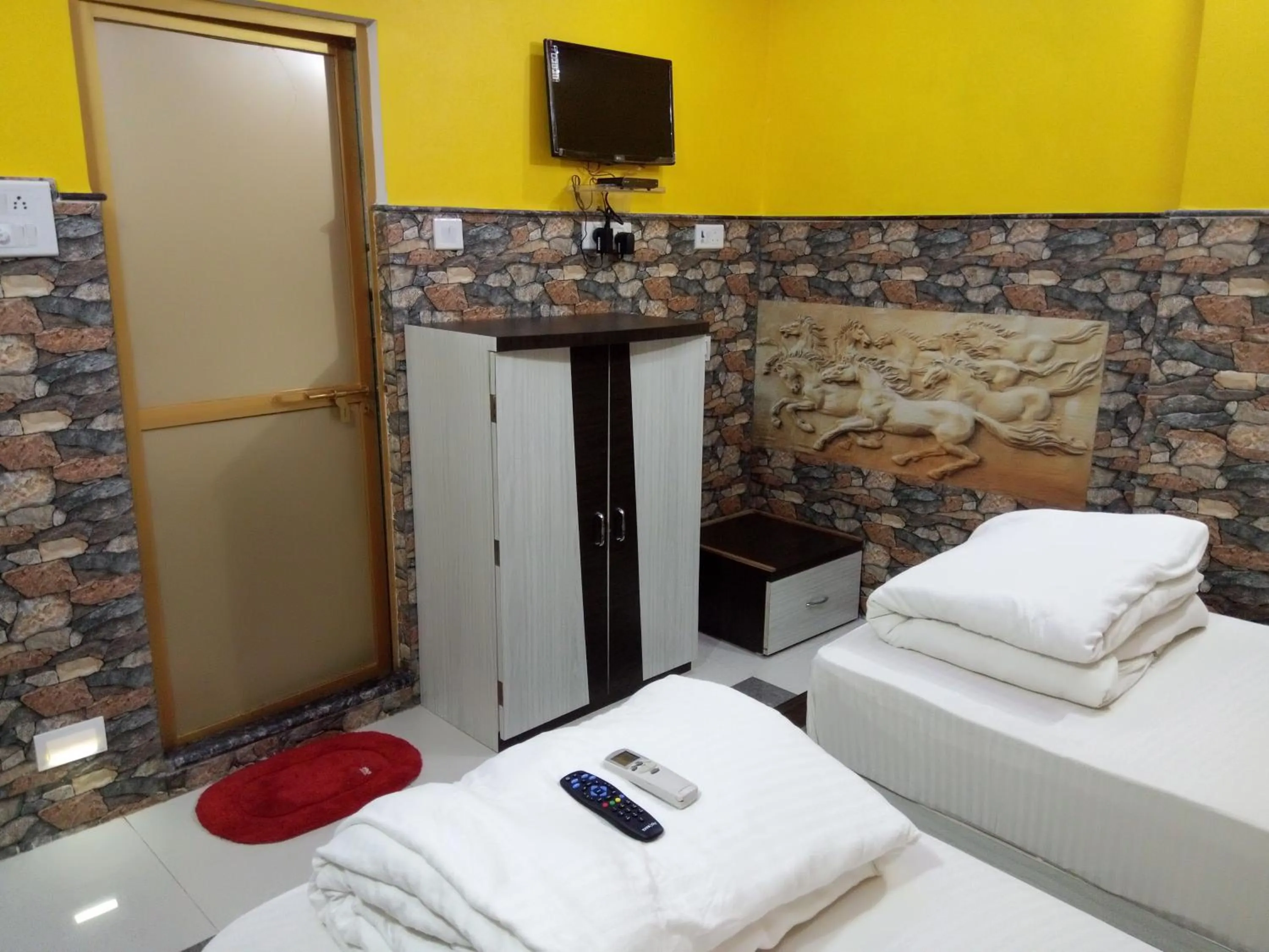 Bed in Hotel Bachchan Palace