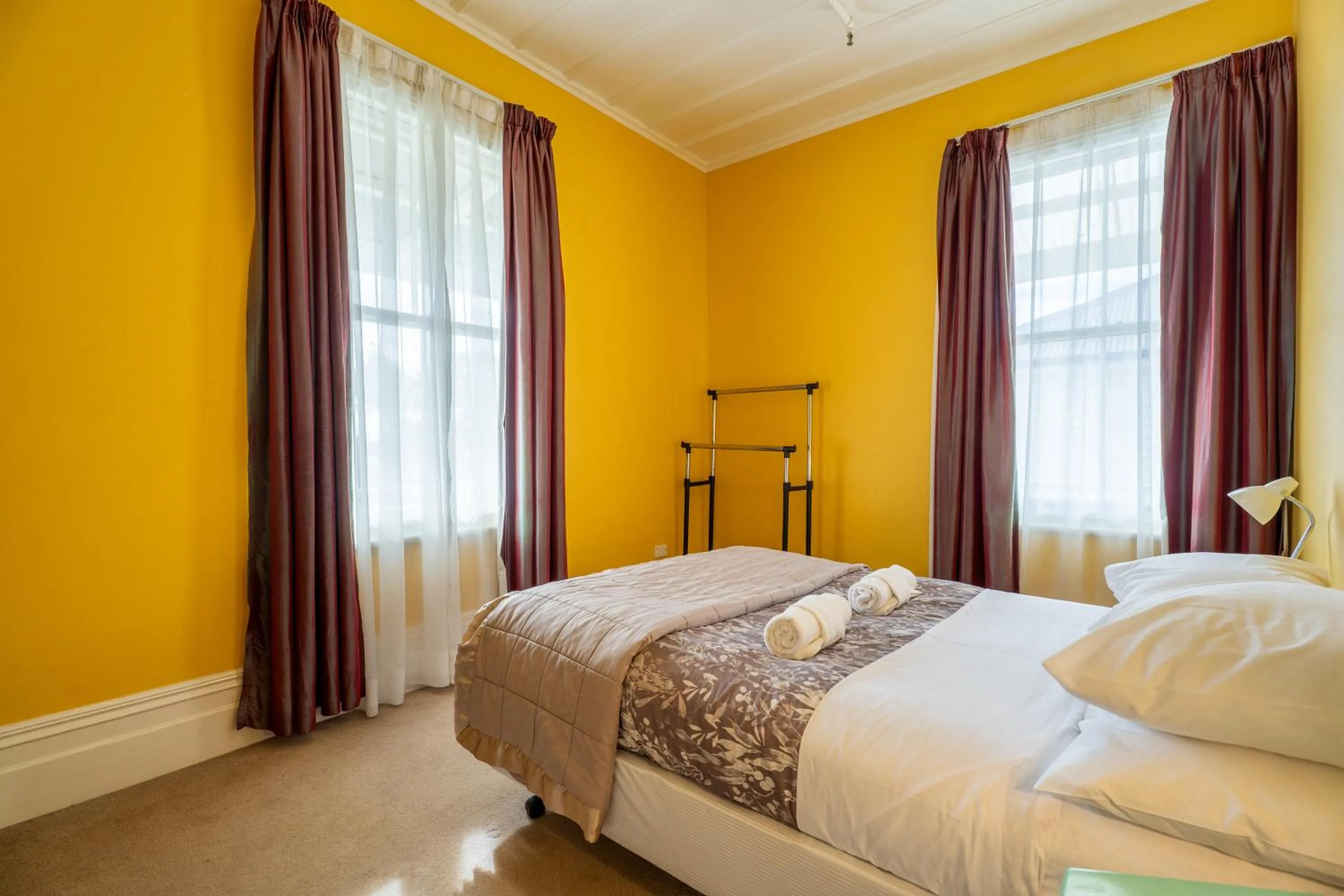 Photo of the whole room, Bed in Verandahs Parkside Lodge