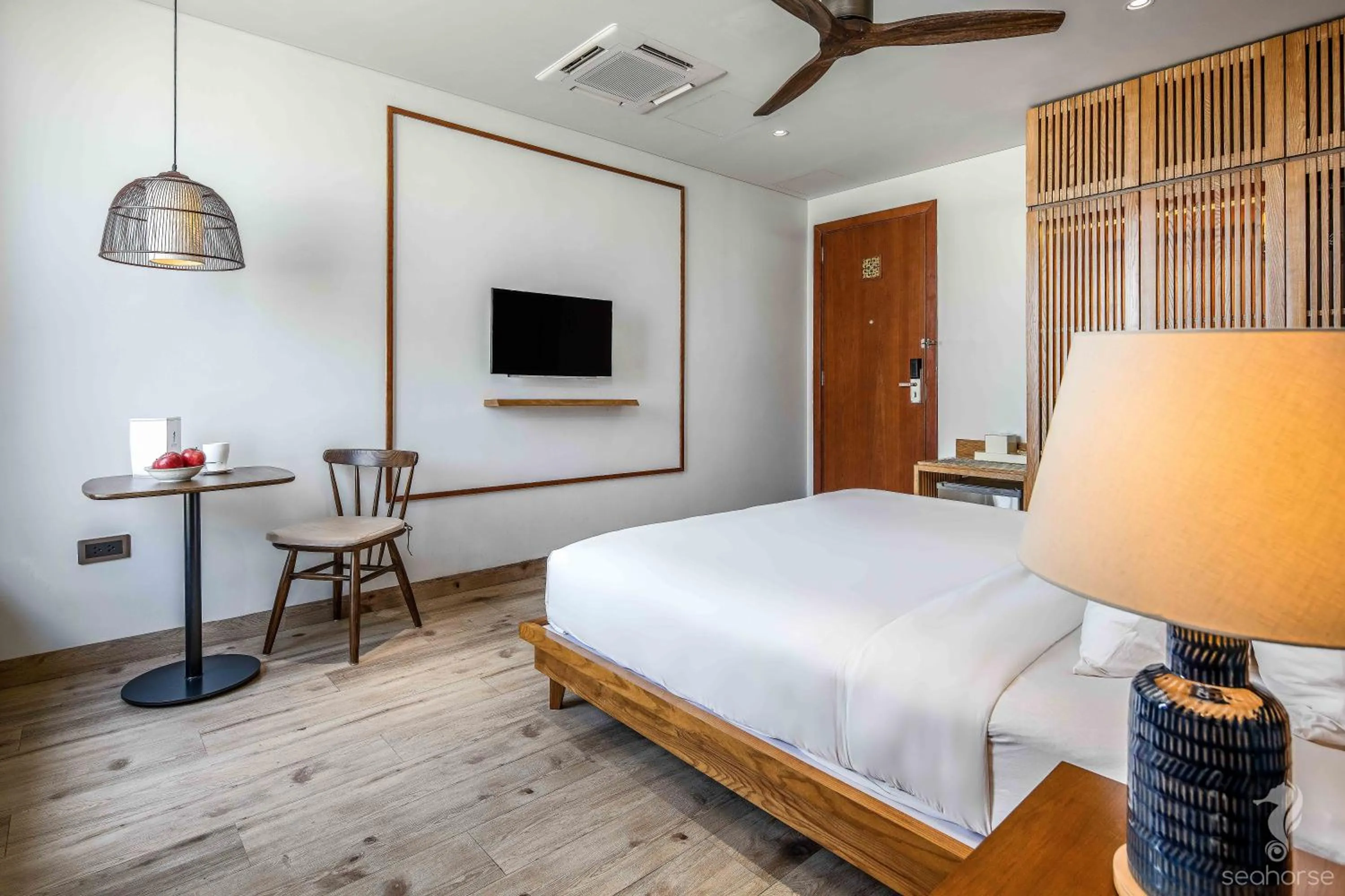 TV and multimedia, Bed in Seahorse Han Market Da Nang Apartment by Haviland