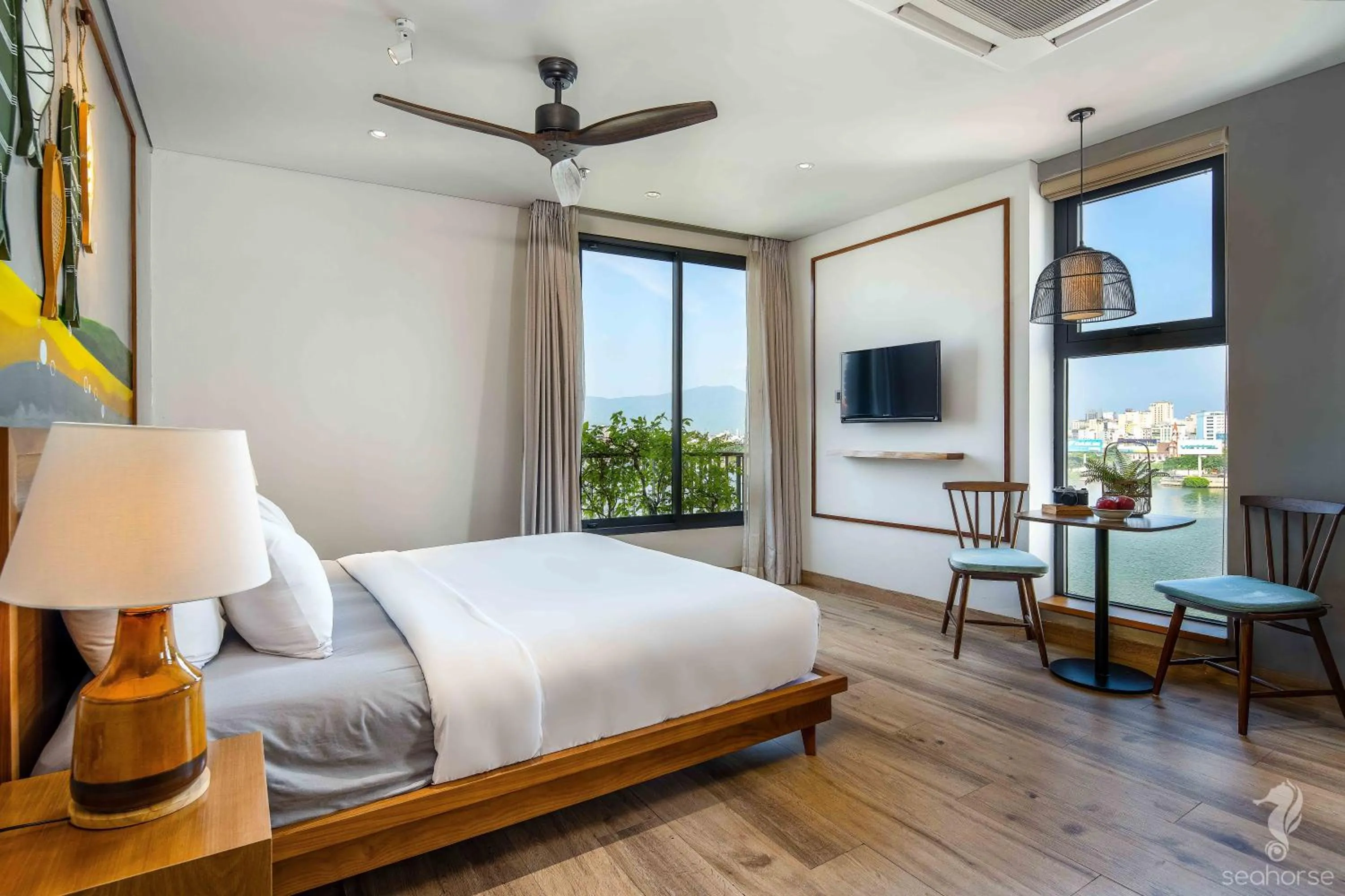 TV and multimedia, Bed in Seahorse Han Market Da Nang Apartment by Haviland