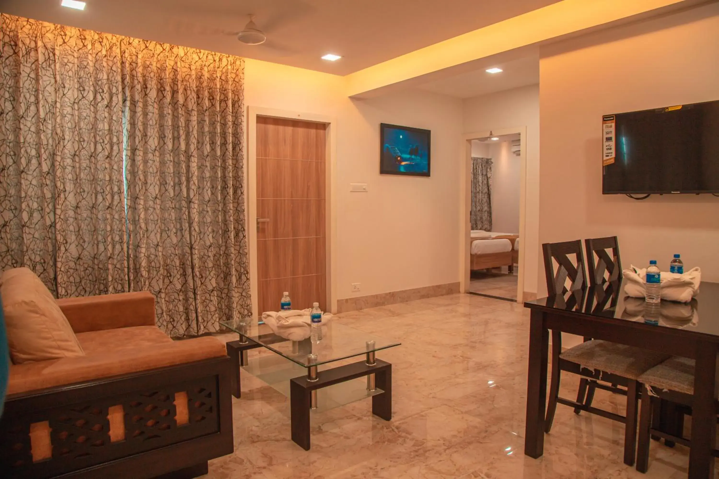 Living room, Bed in Park Avenue Suites Living room, Bed in Park Avenue Suites