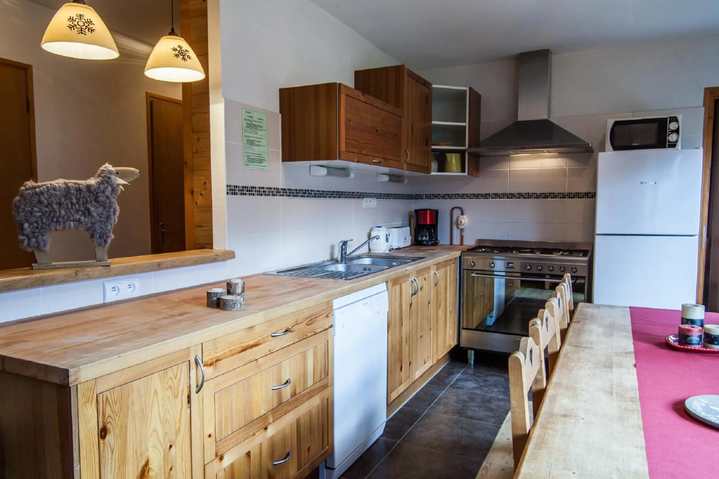 Kitchen or kitchenette in Appartements Giffre et Clesson - DAHU COMPAGNIE