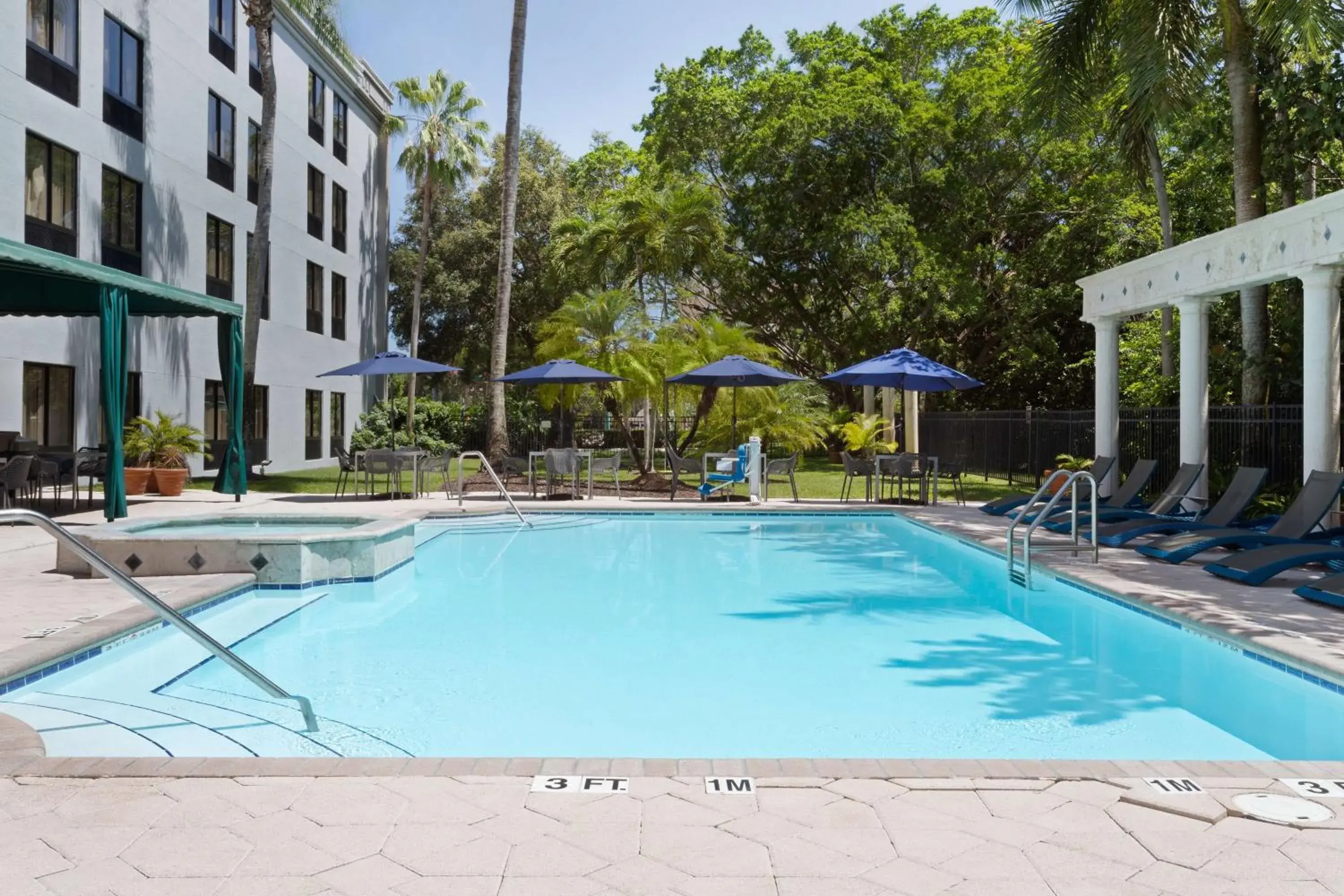 Pool view in Hampton Inn & Suites Boynton Beach Pool view in Hampton Inn & Suites Boynton Beach