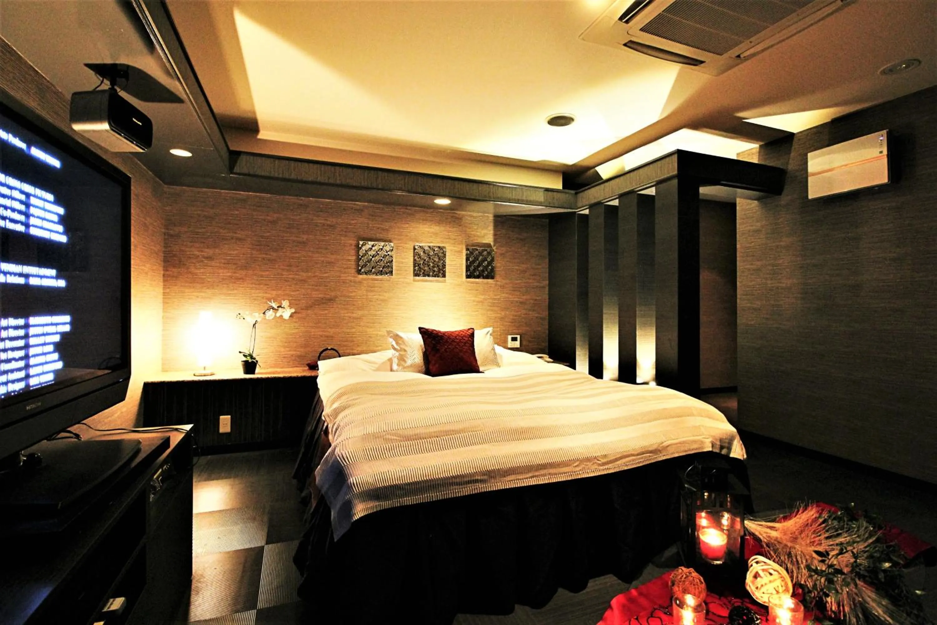 Bed in HOTEL O2 -全室人工ラドン温泉-Adult only