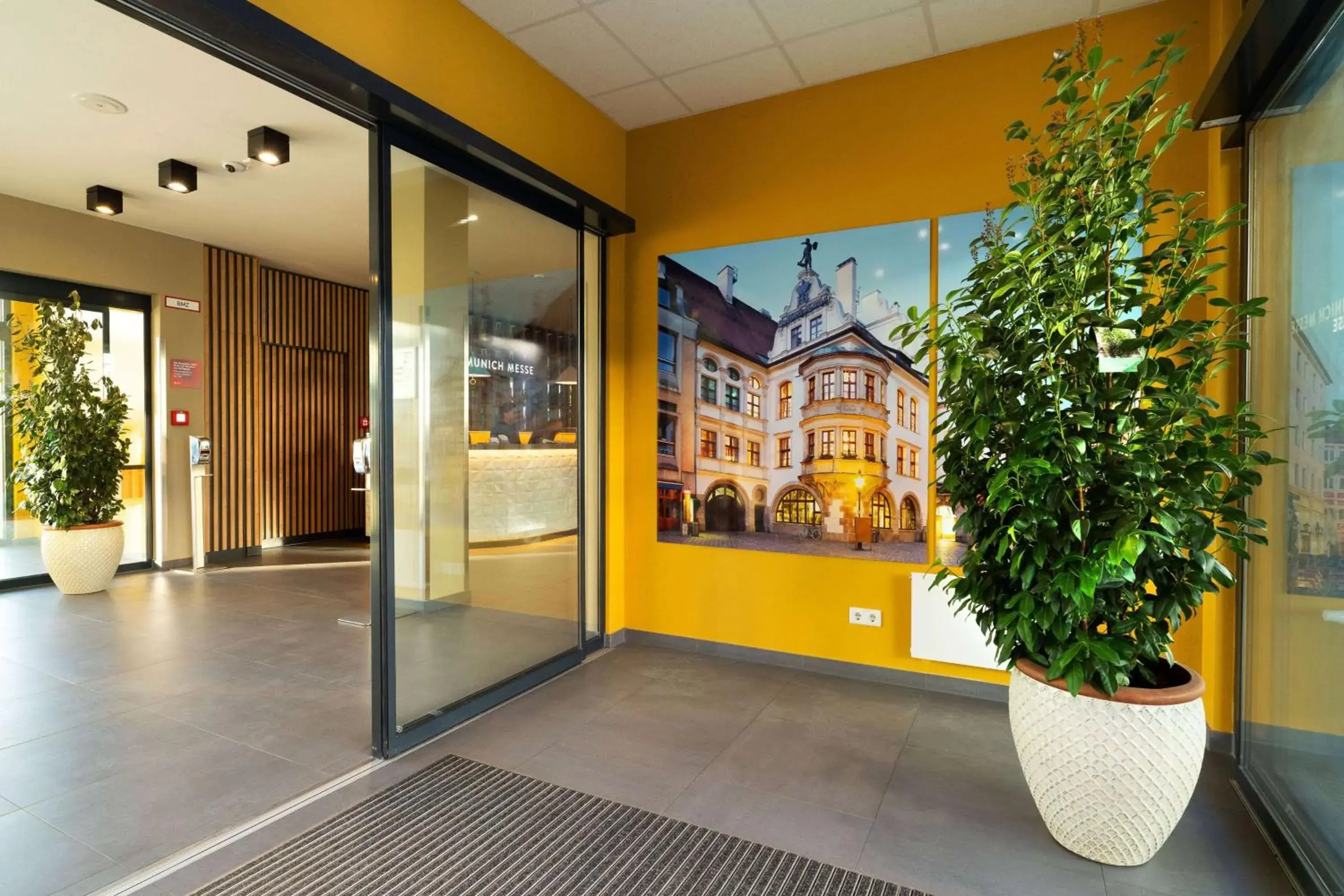 Lobby or reception in Ramada Encore by Wyndham Munich Messe Lobby or reception in Ramada Encore by Wyndham Munich Messe