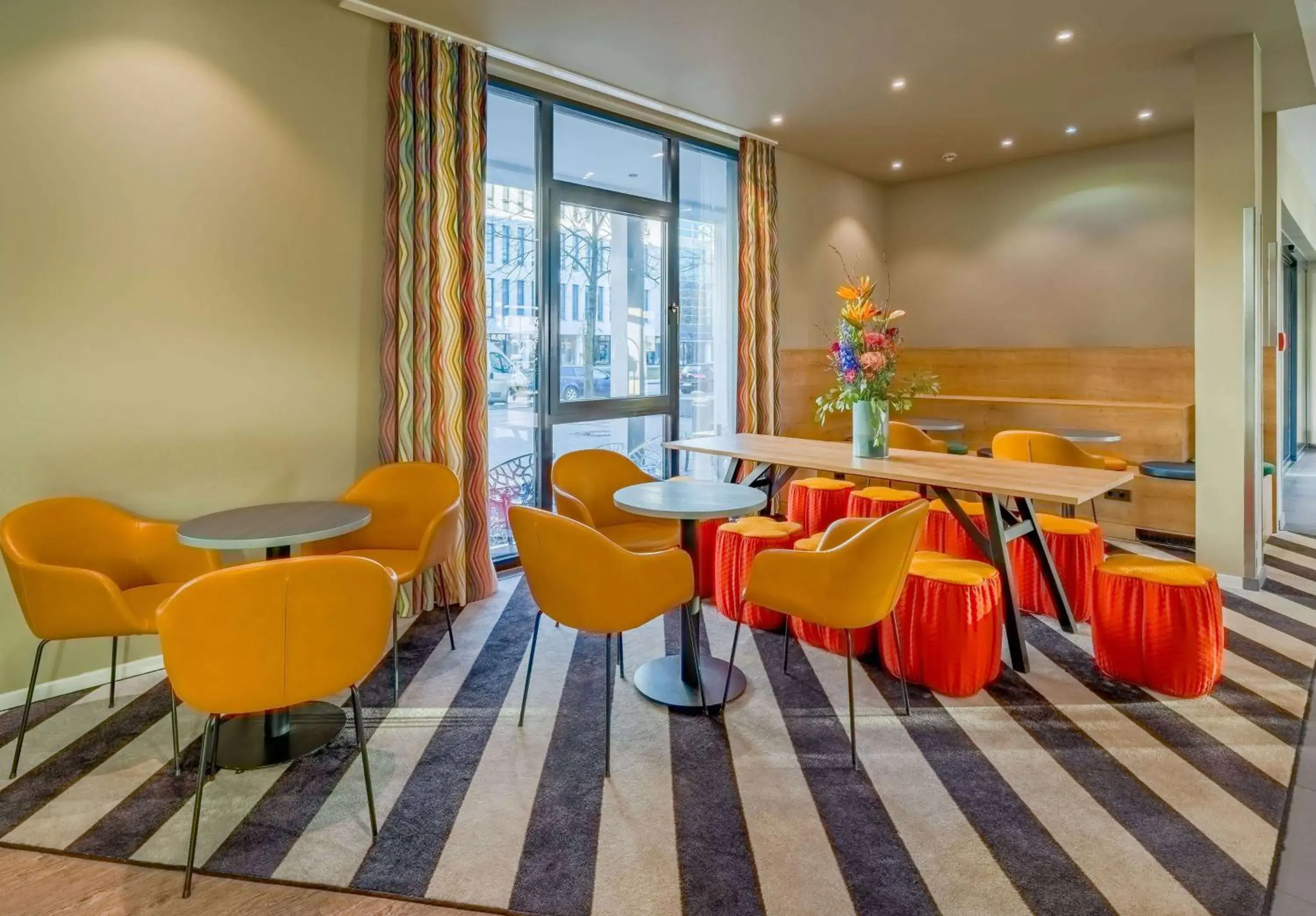 Lobby or reception in Ramada Encore by Wyndham Munich Messe Lobby or reception in Ramada Encore by Wyndham Munich Messe