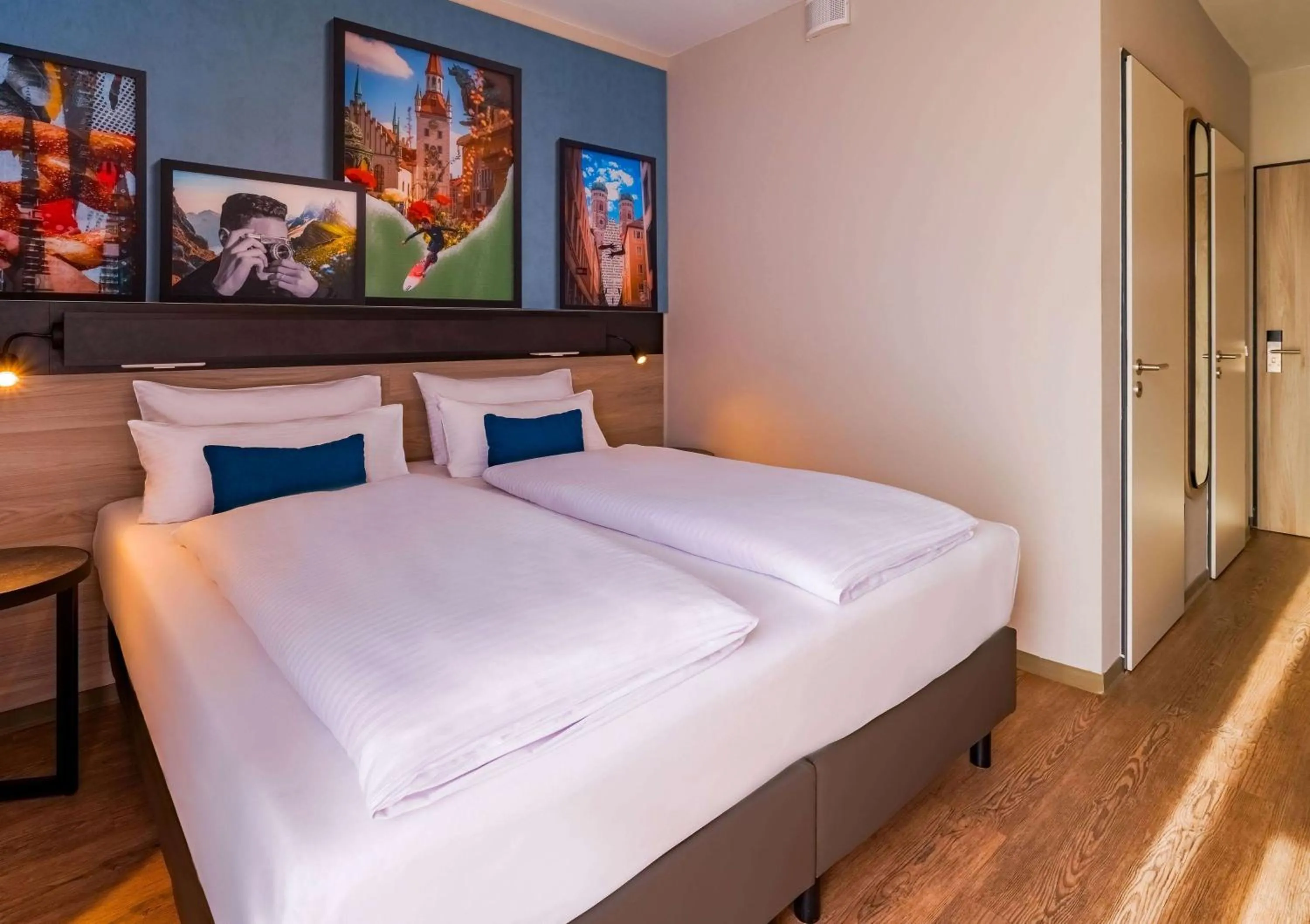 Photo of the whole room, Bed in Ramada Encore by Wyndham Munich Messe