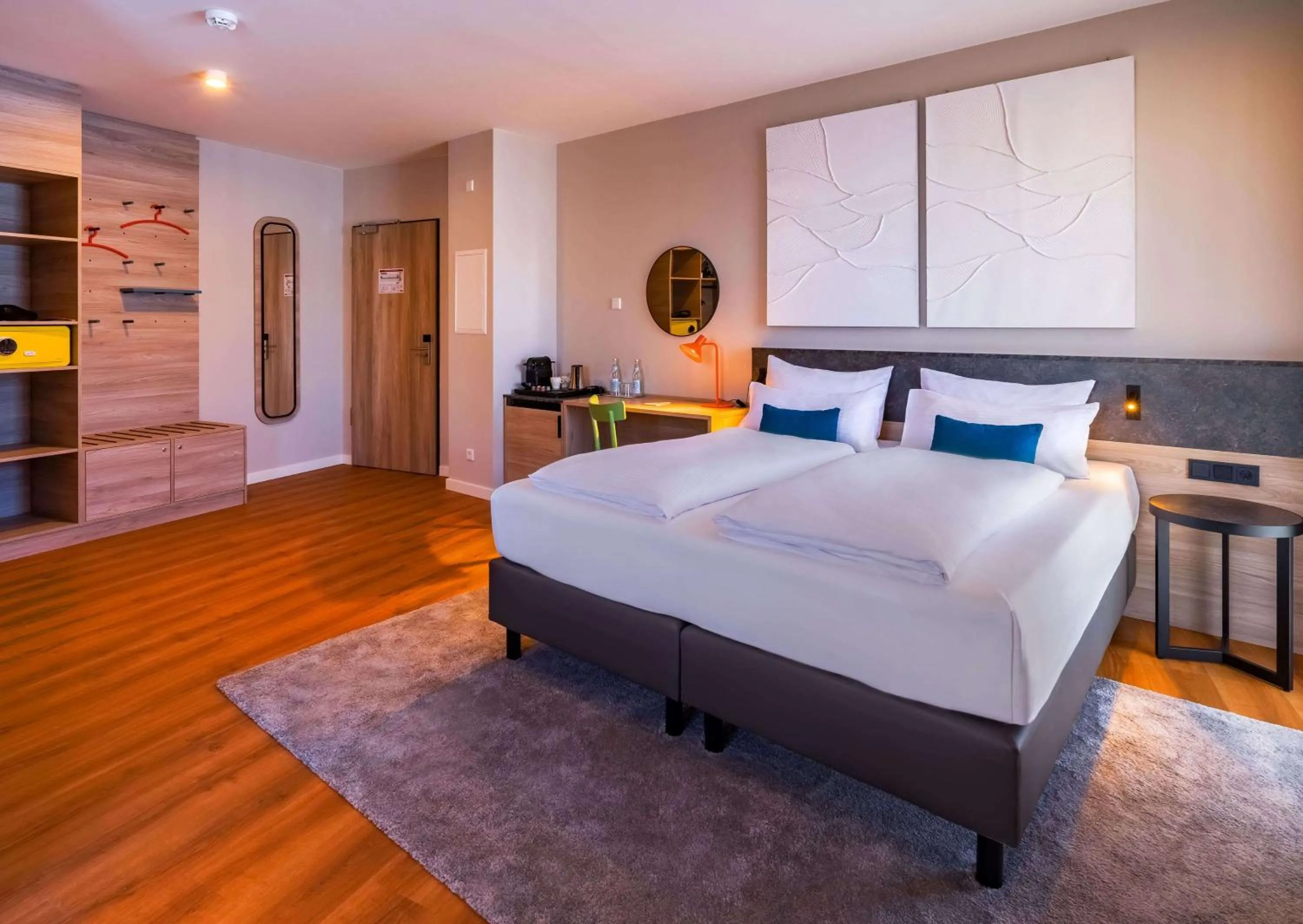 Photo of the whole room, Bed in Ramada Encore by Wyndham Munich Messe