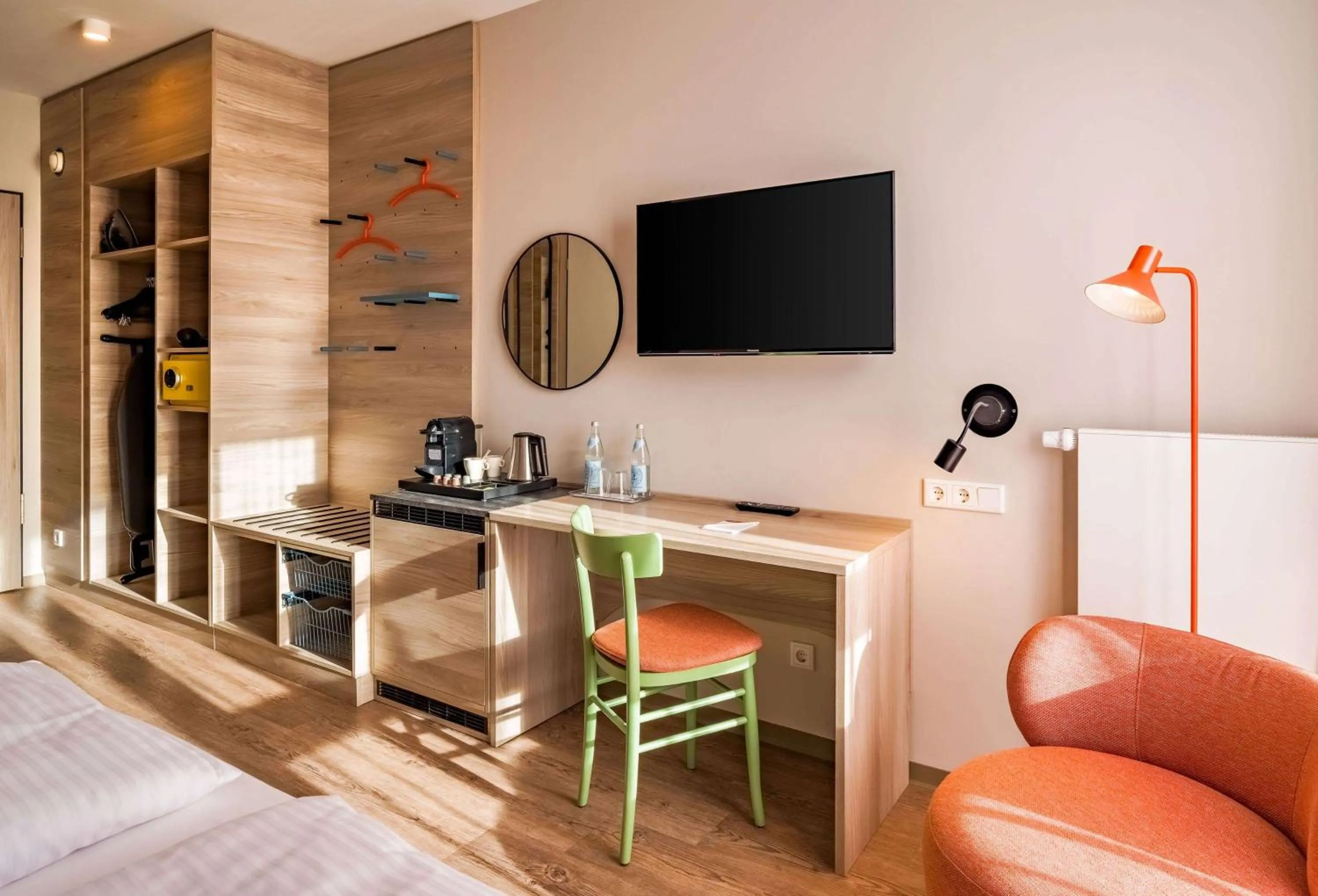 Photo of the whole room, Bed in Ramada Encore by Wyndham Munich Messe