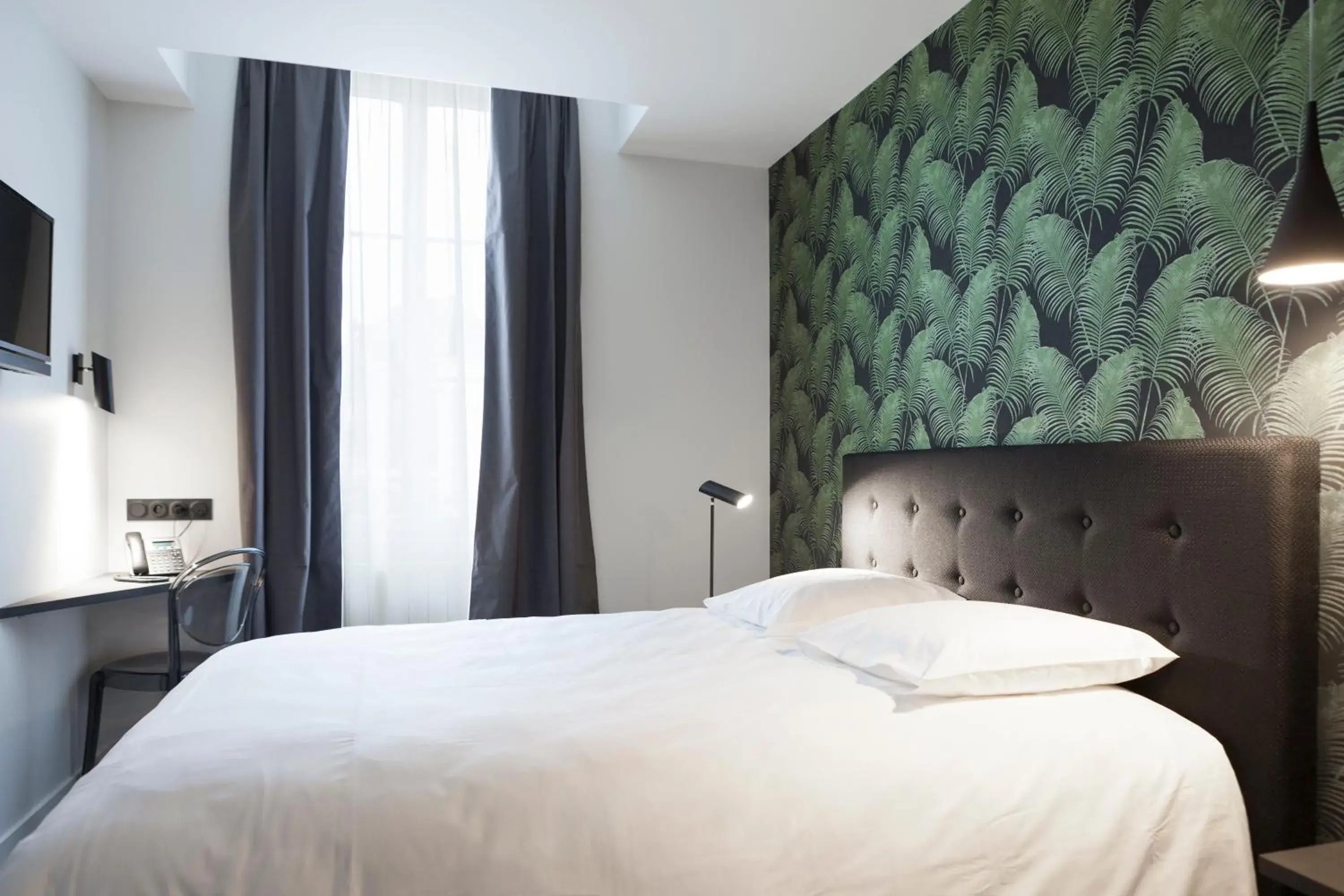 Photo of the whole room, Bed in Logis Hotel du Maine Photo of the whole room, Bed in Logis Hotel du Maine