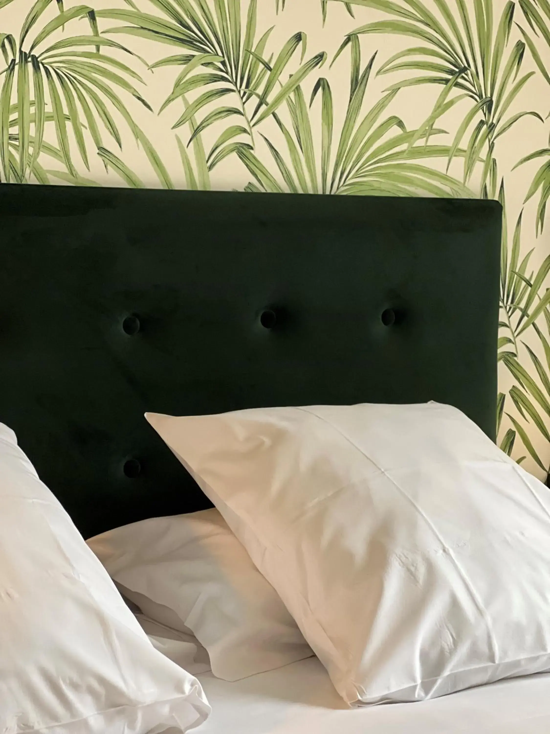 Bed in Logis Hotel du Maine Bed in Logis Hotel du Maine