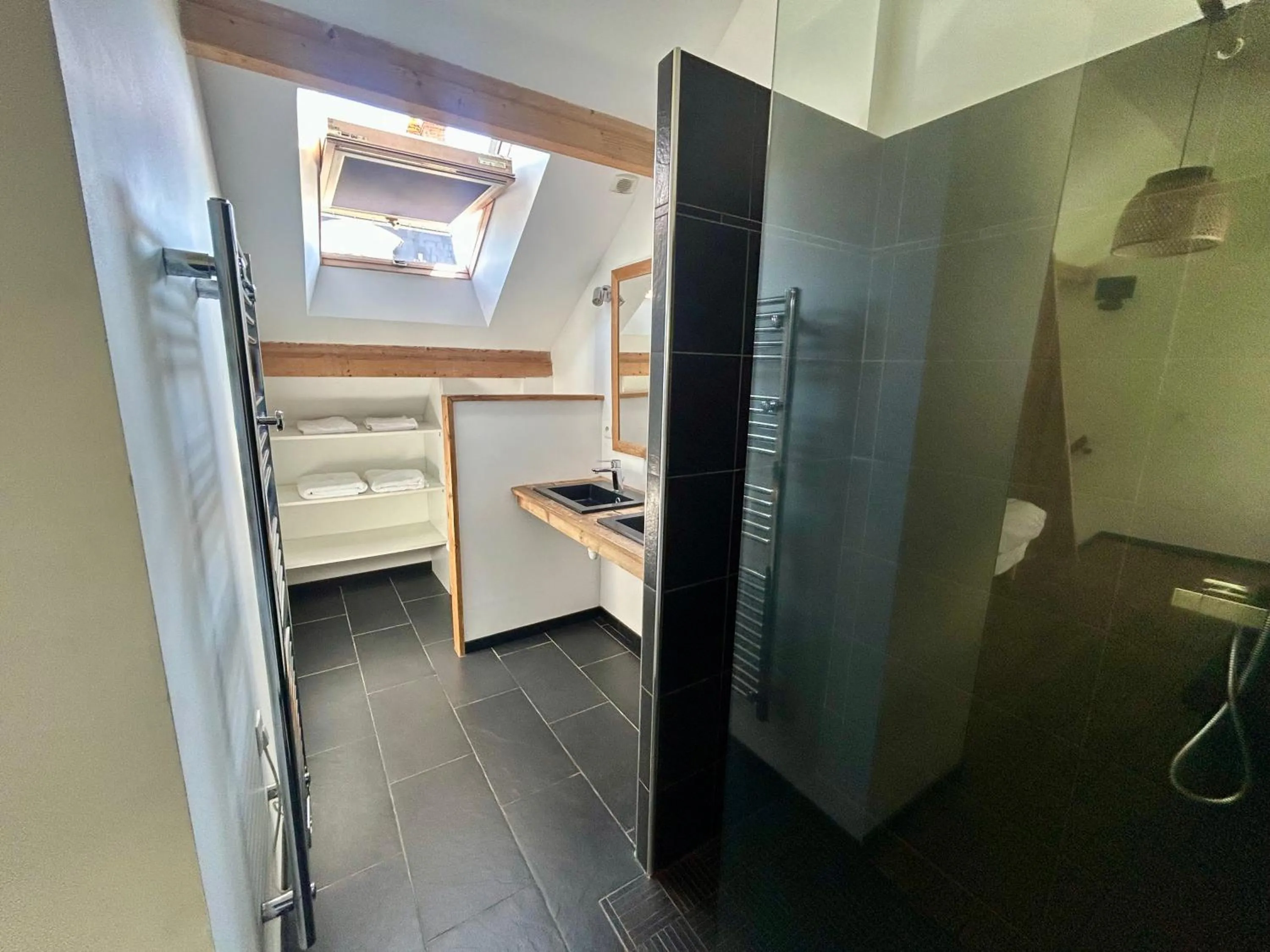 Bed in Logis Hotel du Maine