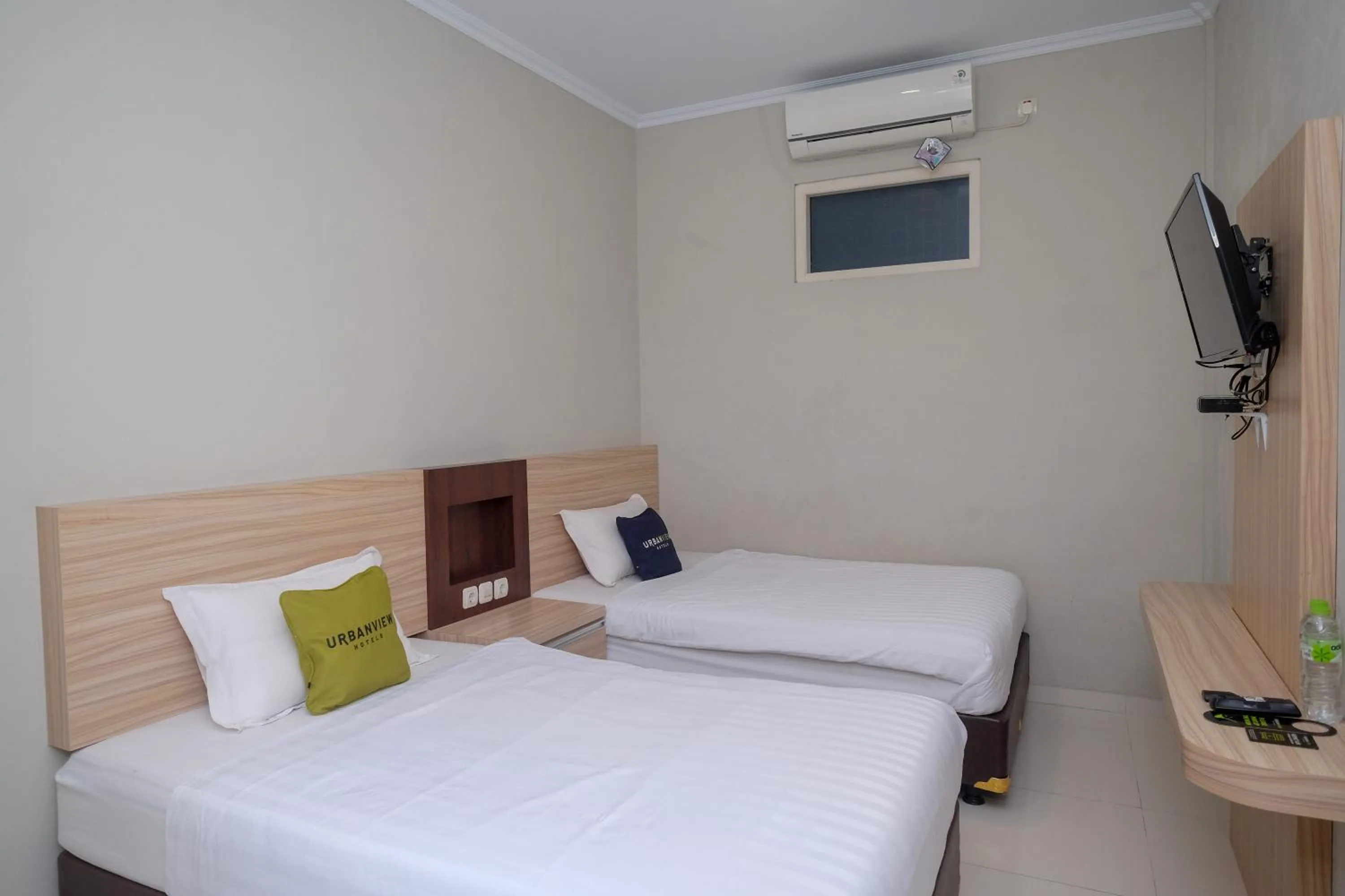 Bed in Urbanview Stay at H jakal by RedDoorz