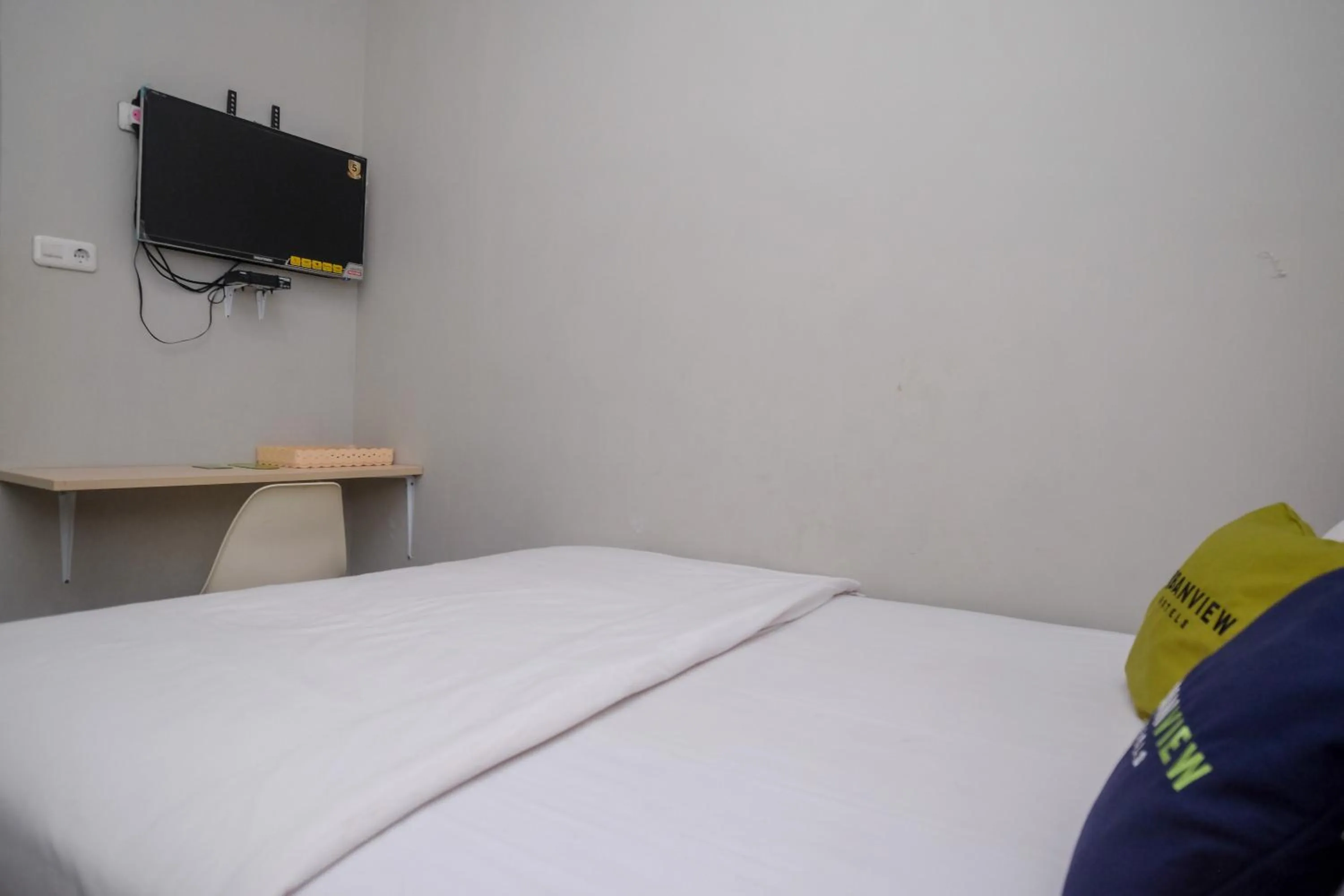 Bed in Urbanview Stay at H jakal by RedDoorz