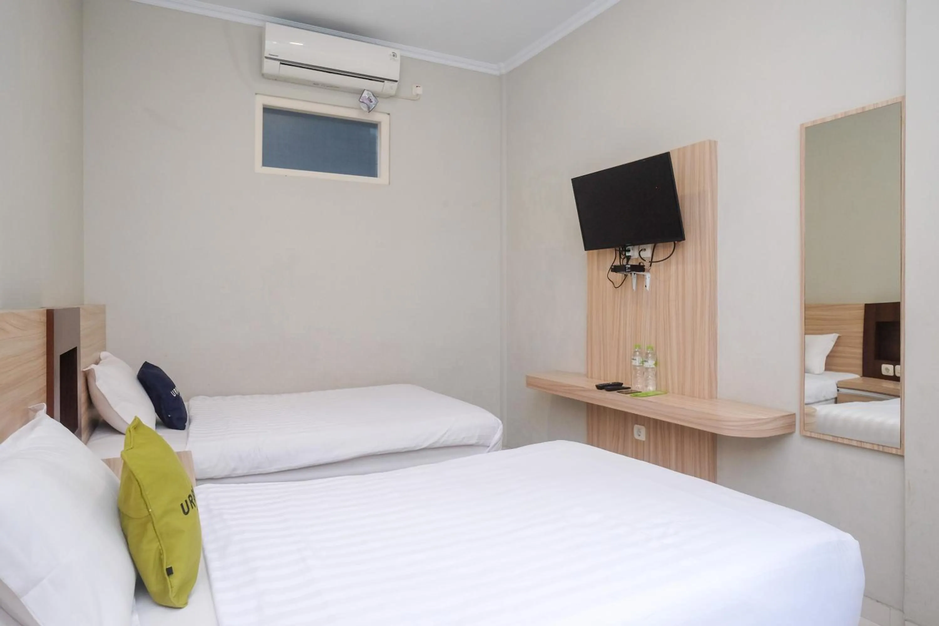 Bed in Urbanview Stay at H jakal by RedDoorz