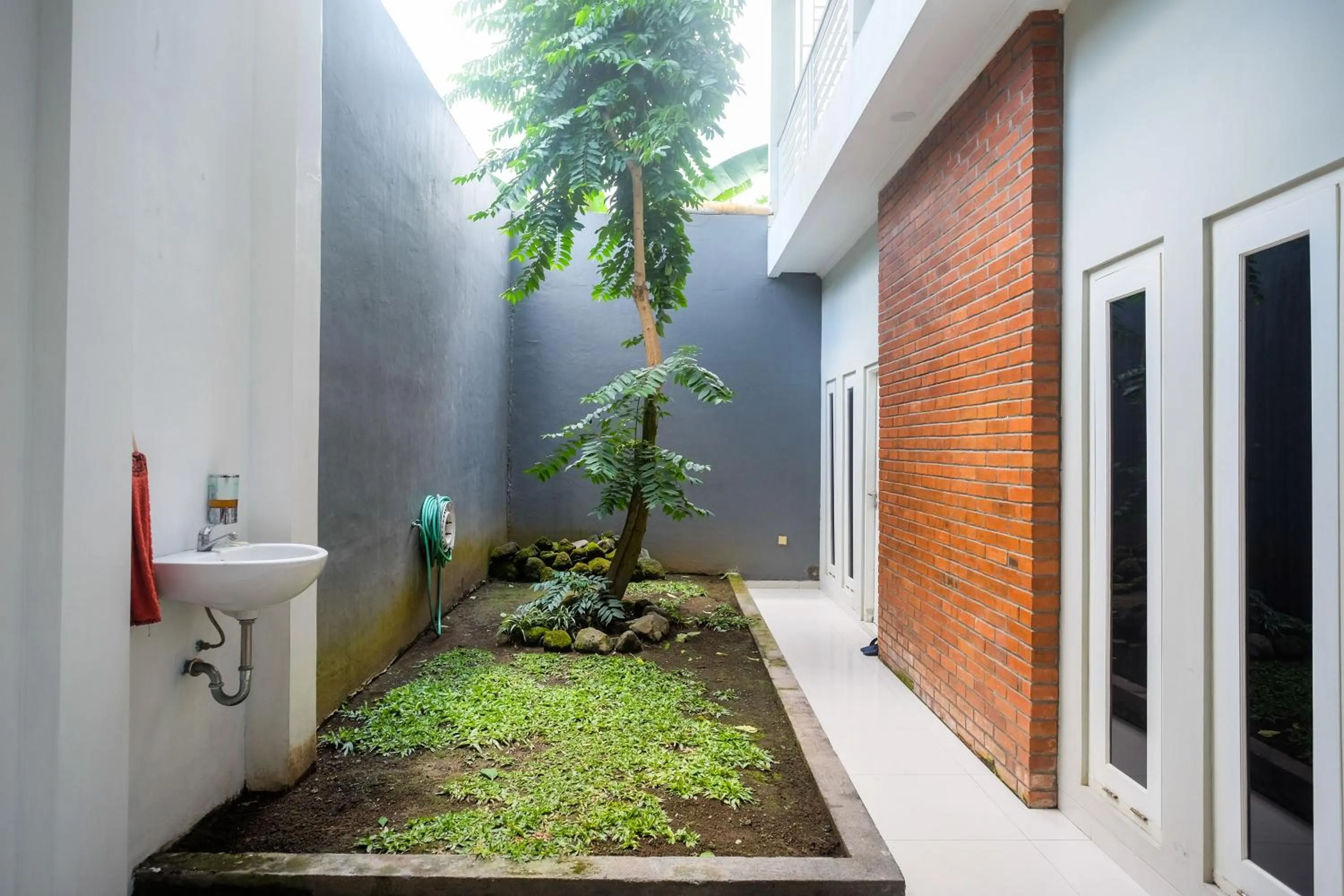 Garden in Urbanview Stay at H jakal by RedDoorz