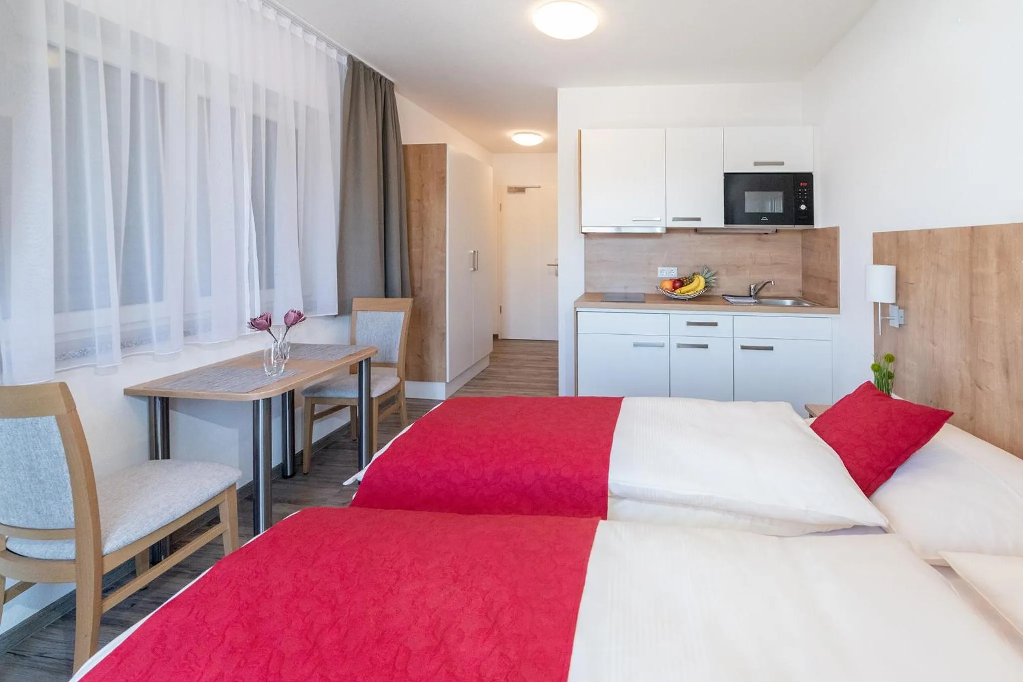 Photo of the whole room, Bed in Boardinghaus Bayerwaldpark