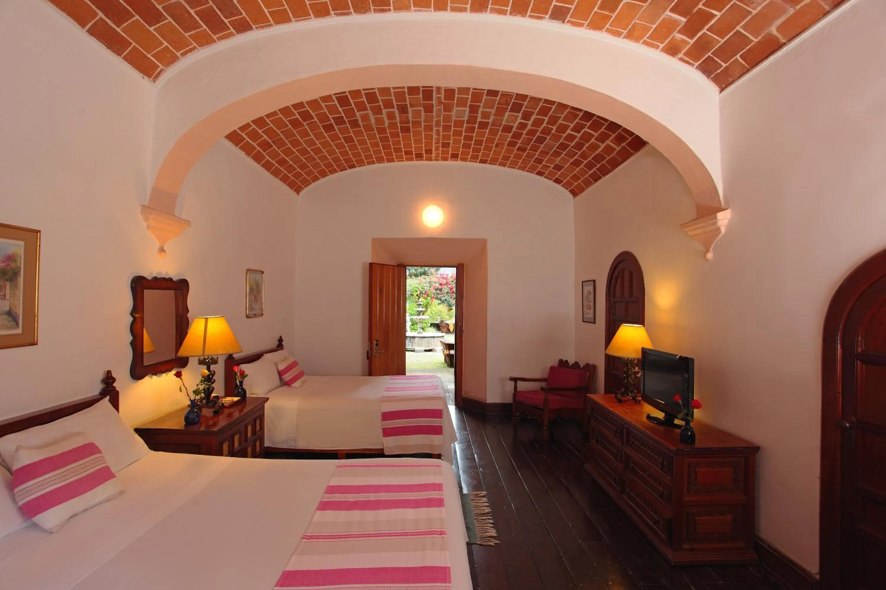 Bed in Posada del Tepozteco - Hotel & Gallery