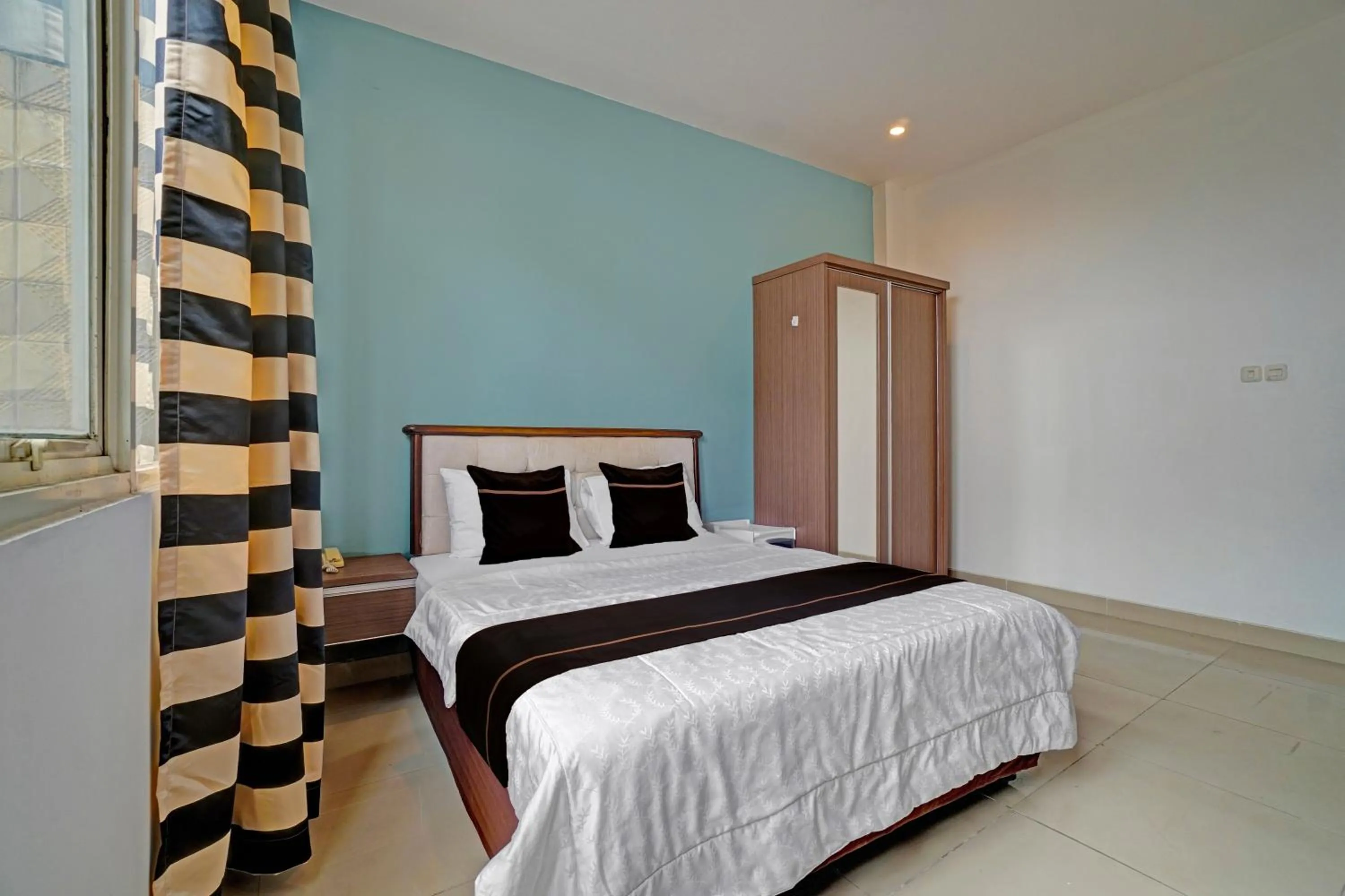 Deluxe Double Room in OYO 170 RBN Stays