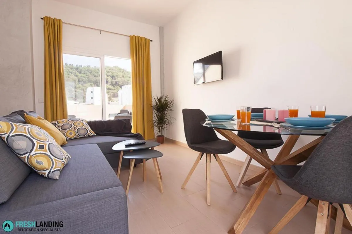 Living room in Rayito by FreshApartments by Bossh! Apartments