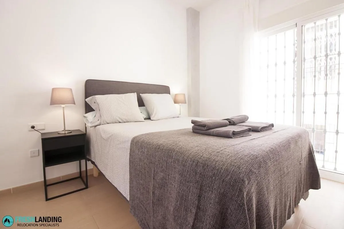 Bedroom, Bed in Rayito by FreshApartments by Bossh! Apartments