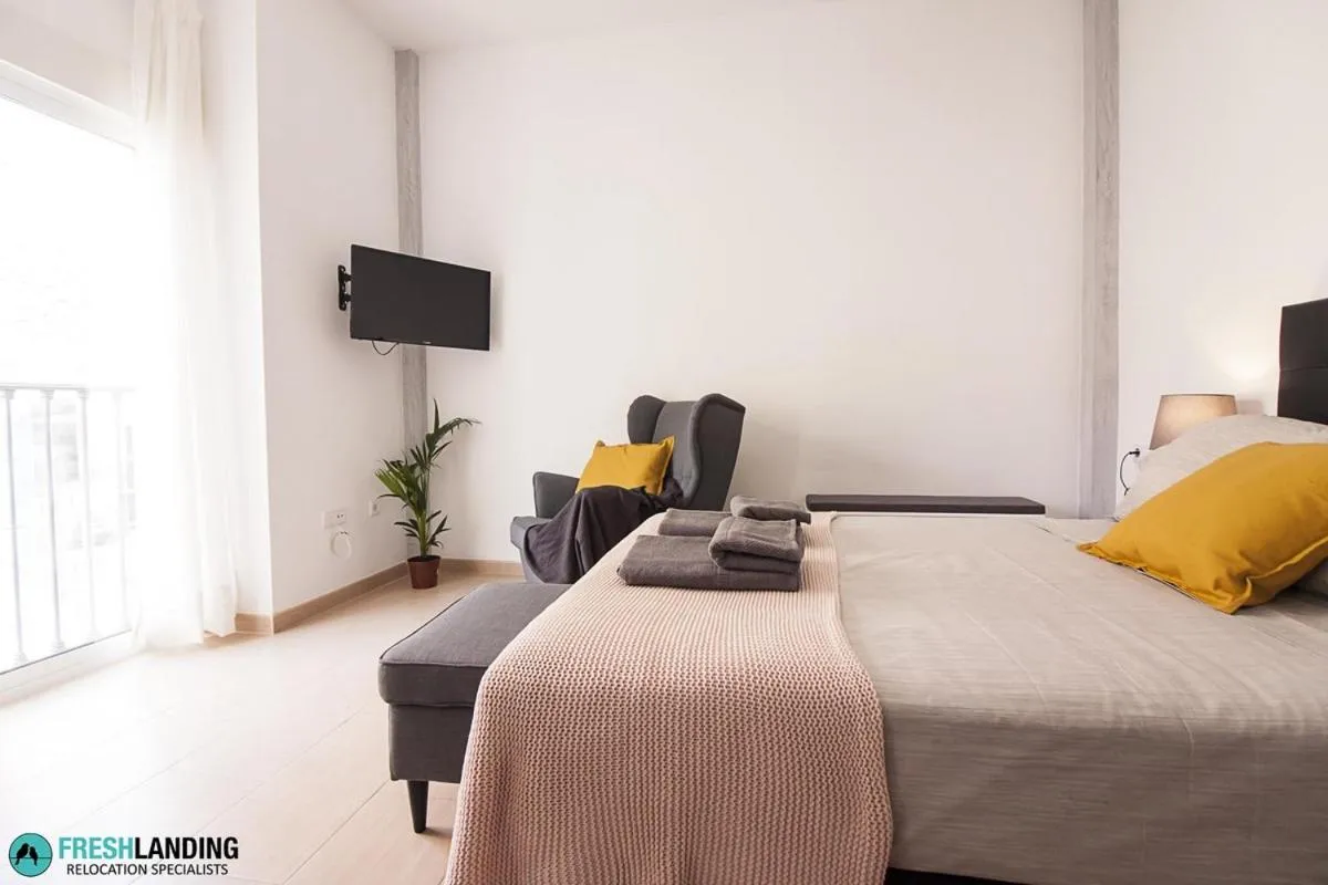 Bedroom, Bed in Rayito by FreshApartments by Bossh! Apartments