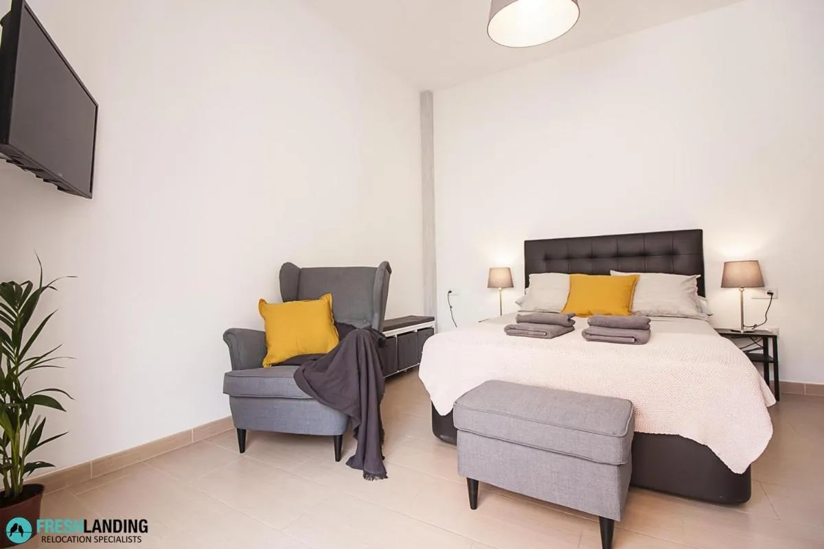 Bedroom, Bed in Rayito by FreshApartments by Bossh! Apartments