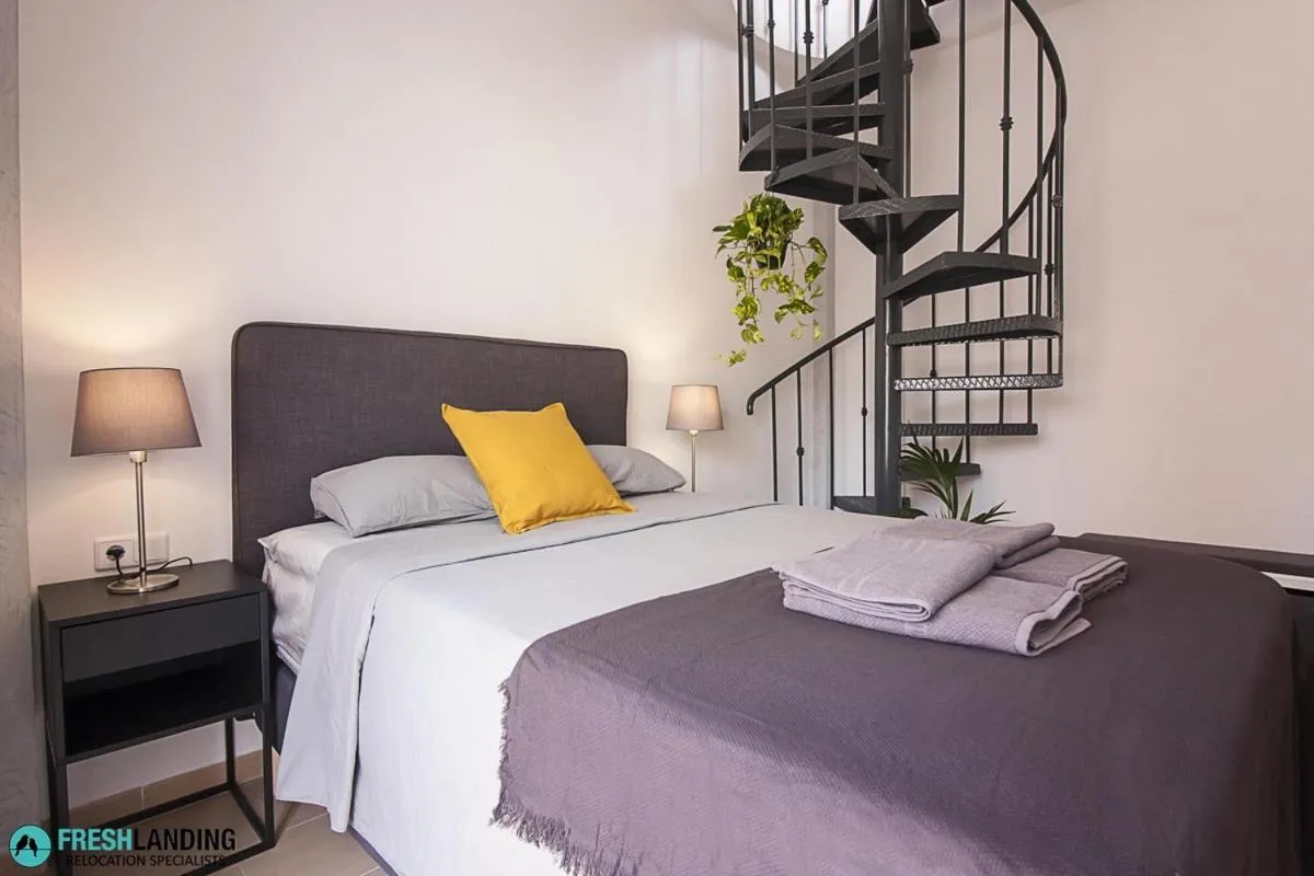 Bedroom, Bed in Rayito by FreshApartments by Bossh! Apartments