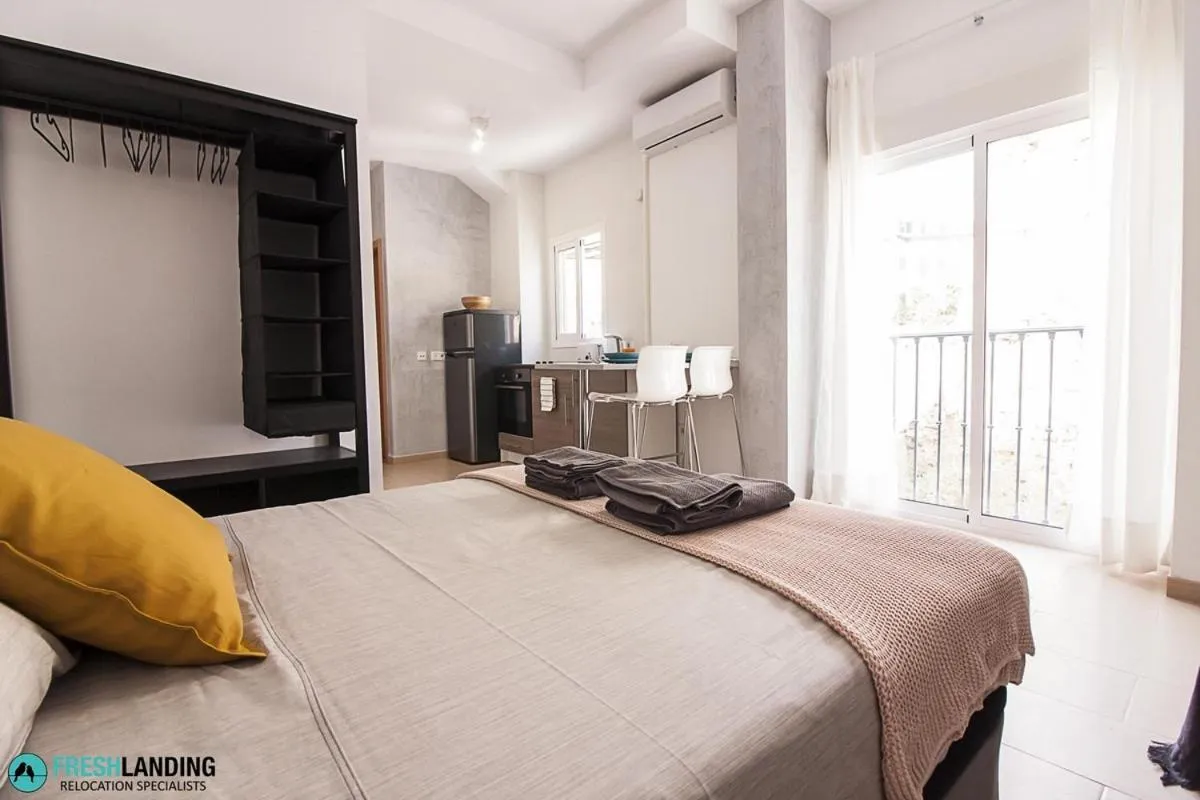 Bedroom, Bed in Rayito by FreshApartments by Bossh! Apartments