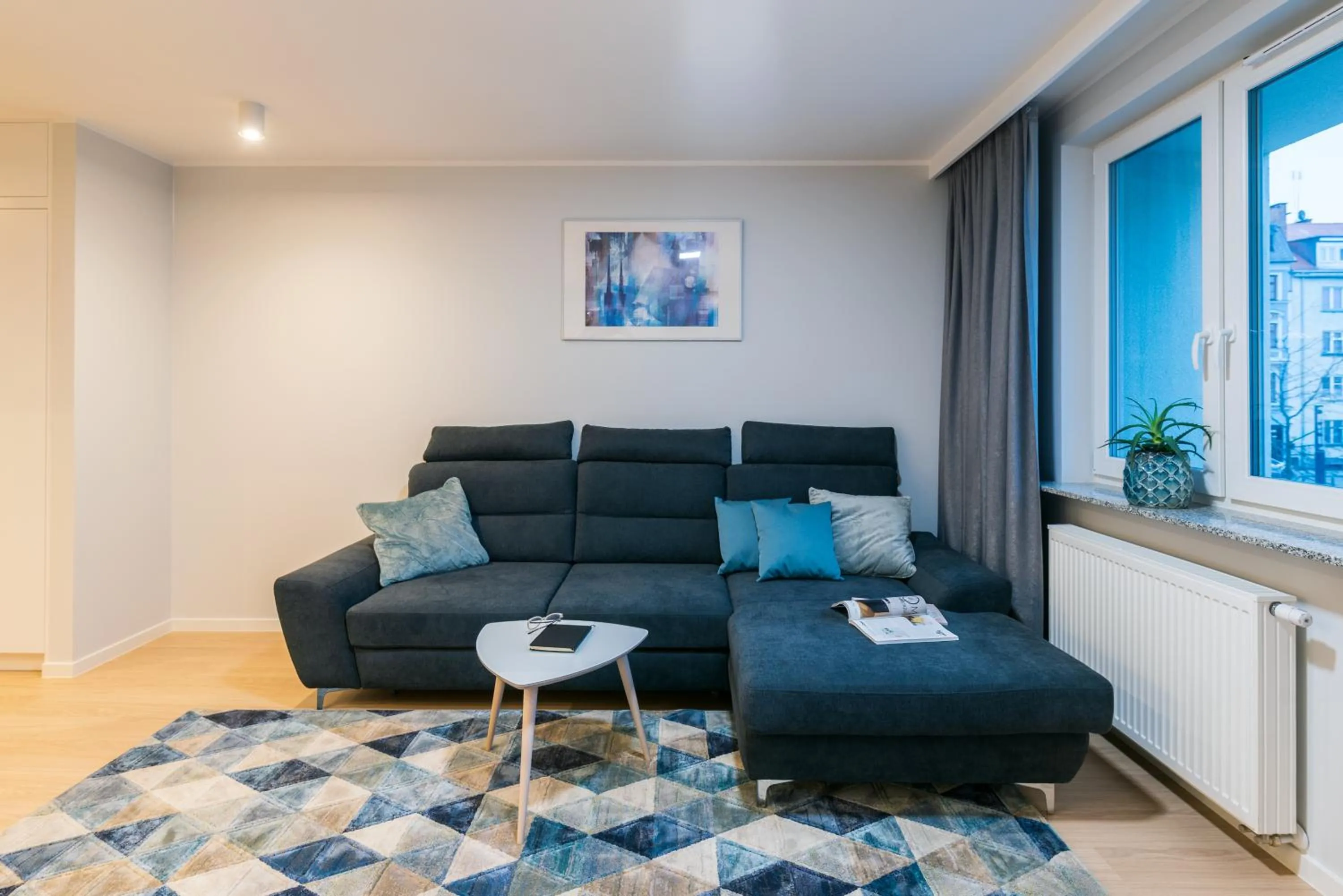 Living room in Q17 Apartments Rynek