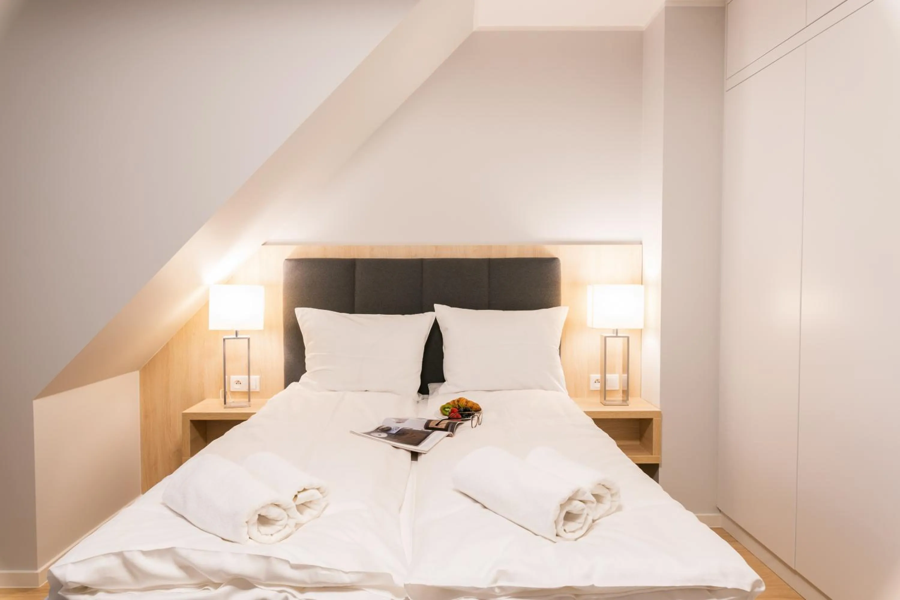 Bed in Q17 Apartments Rynek