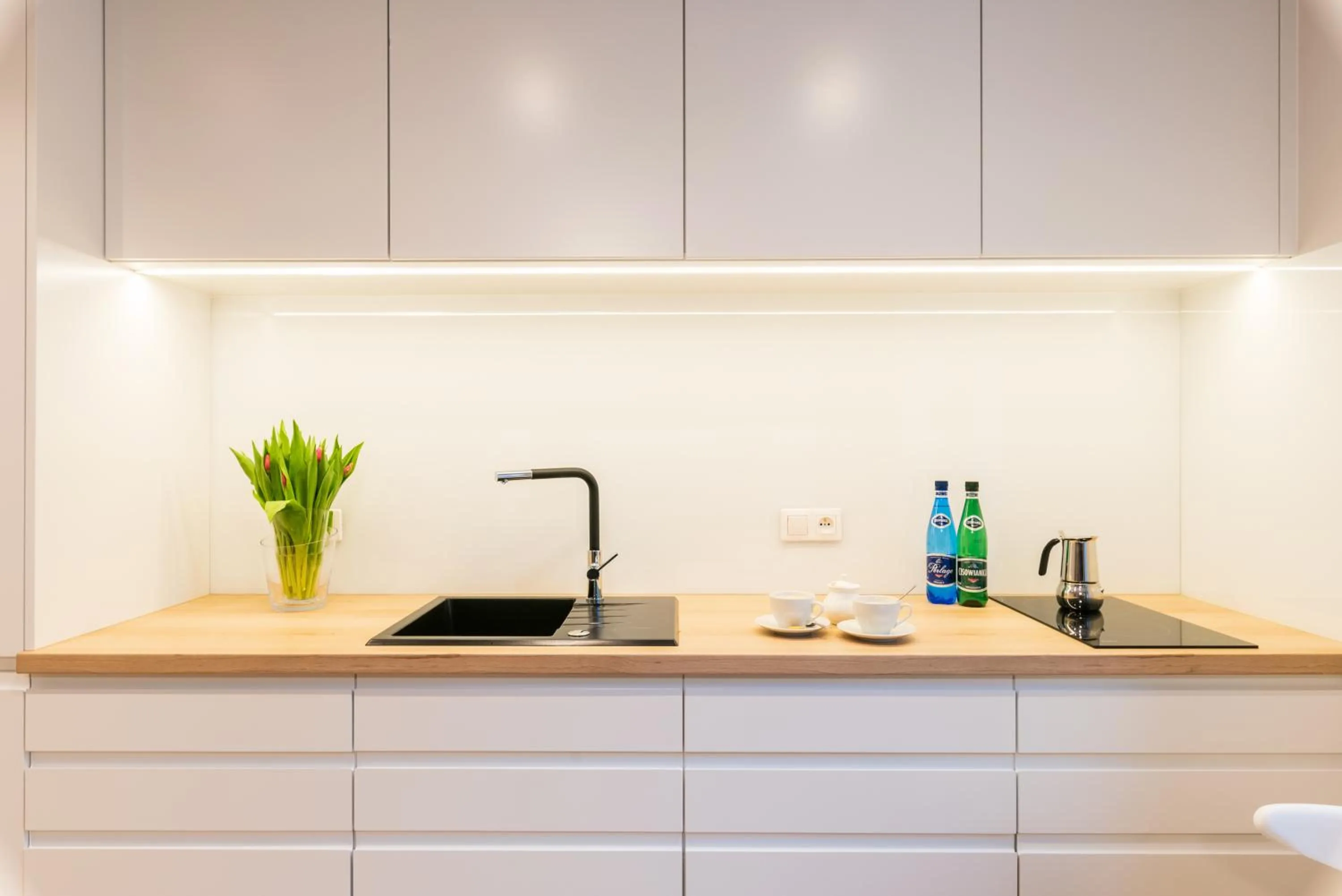 Kitchen or kitchenette in Q17 Apartments Rynek