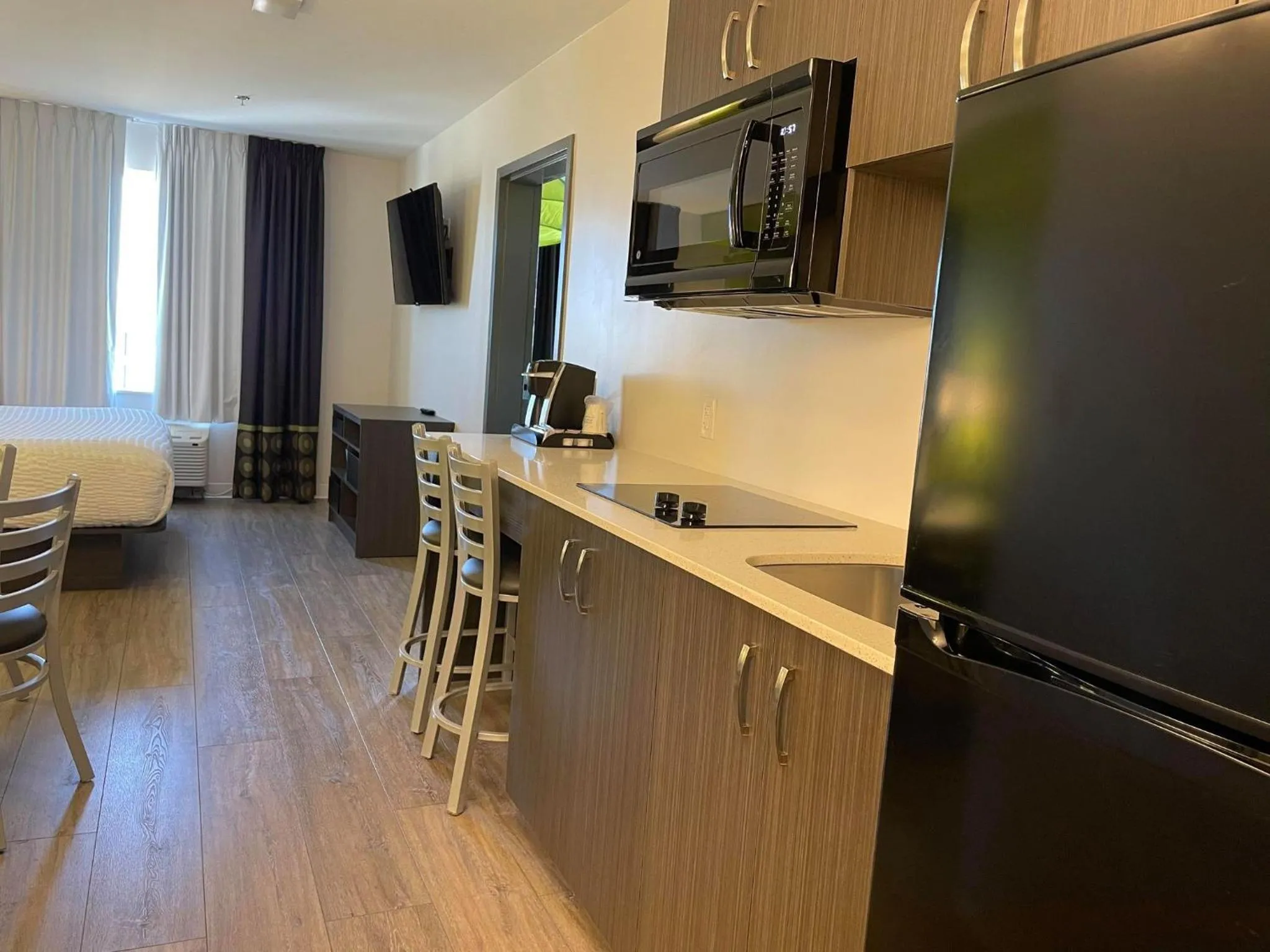 Kitchen or kitchenette in Super 8 by Wyndham Winnipeg East MB