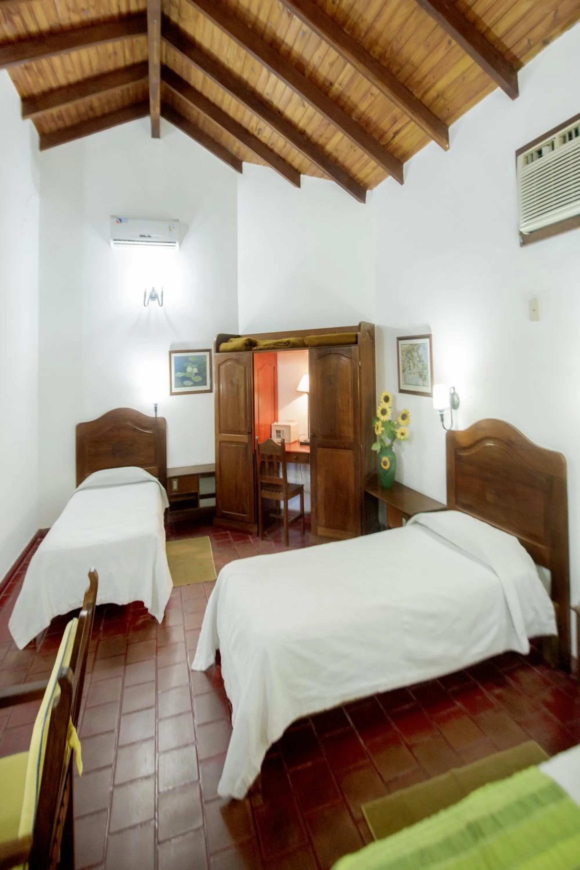 Bed in Hostería Posada del Sol